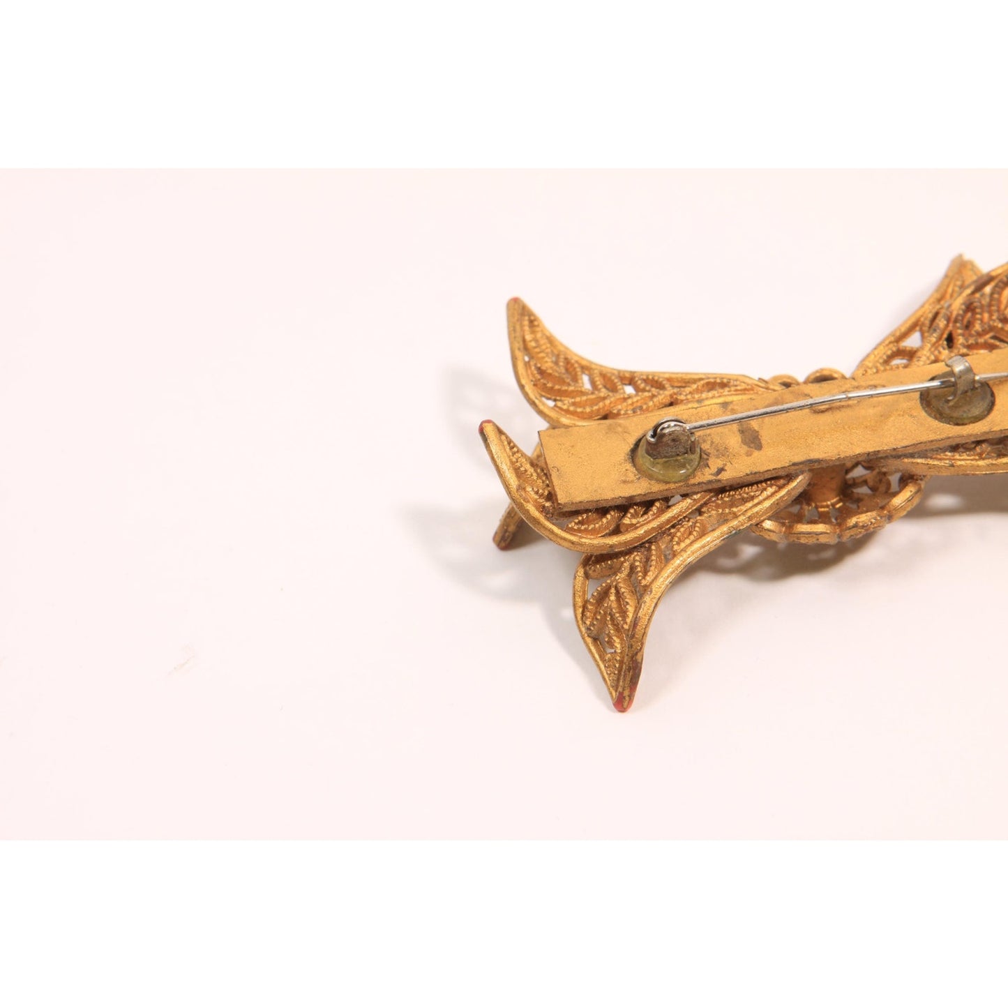 1940s Novelty Gold Tone Plastic Celluloid Bow Brooch