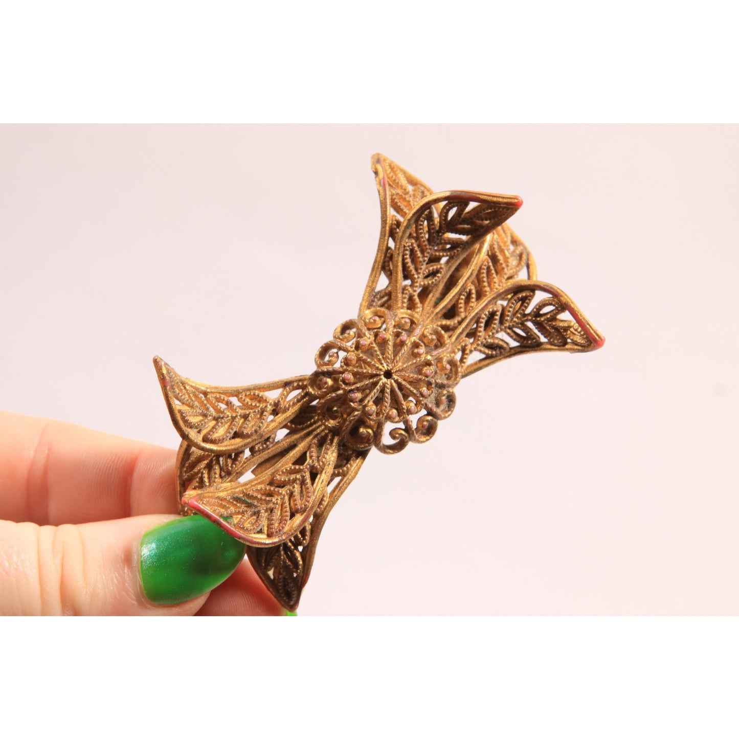 1940s Novelty Gold Tone Plastic Celluloid Bow Brooch