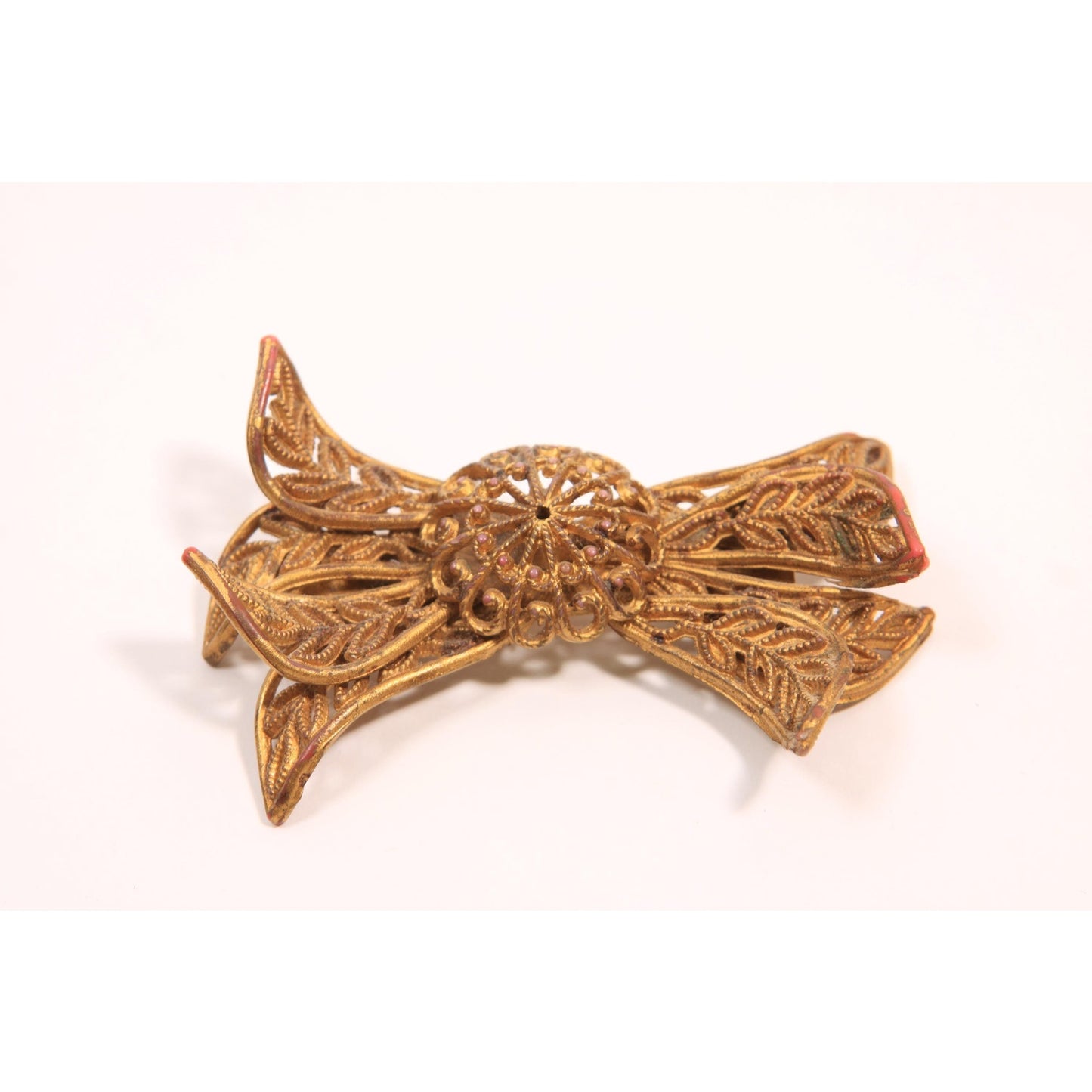 1940s Novelty Gold Tone Plastic Celluloid Bow Brooch