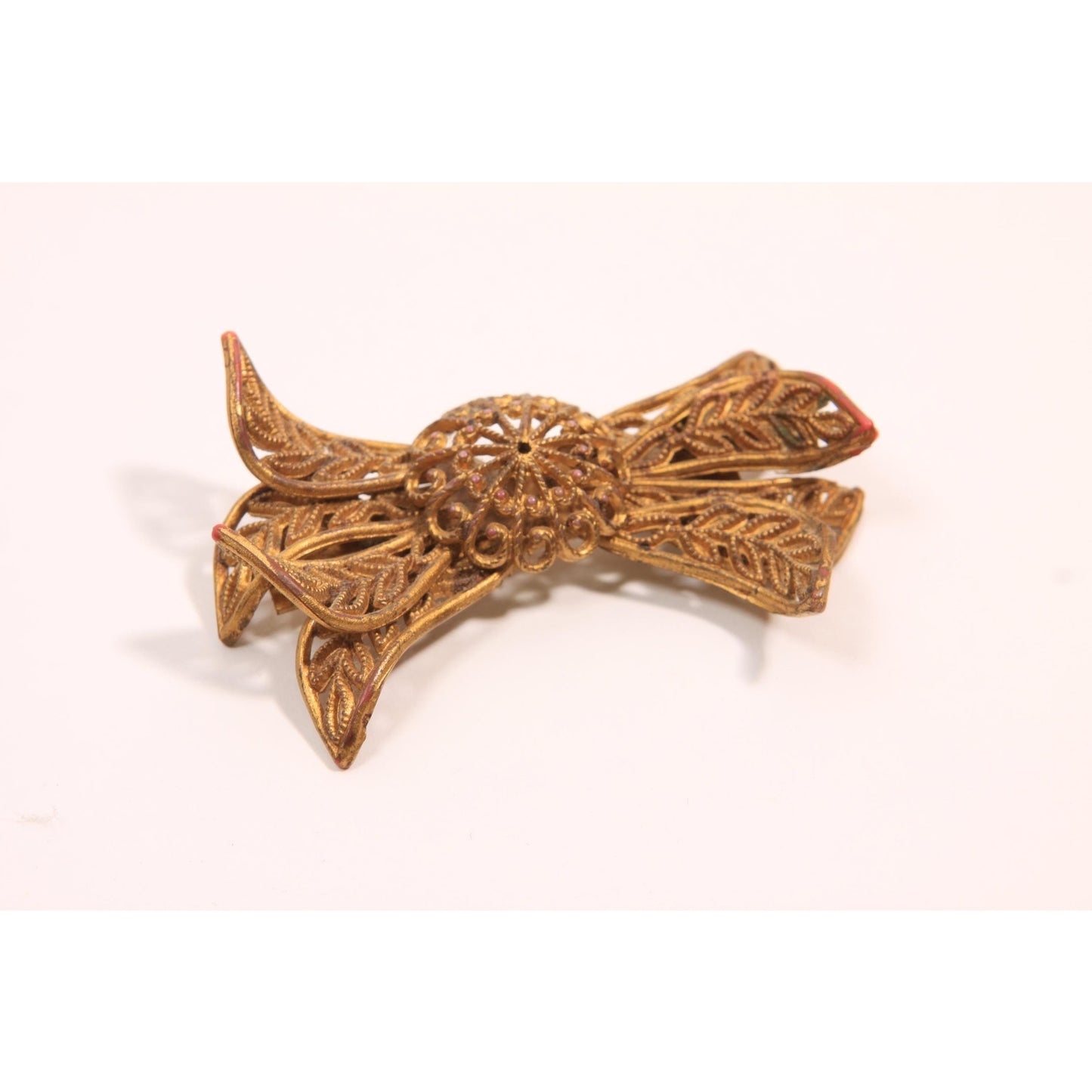 1940s Novelty Gold Tone Plastic Celluloid Bow Brooch