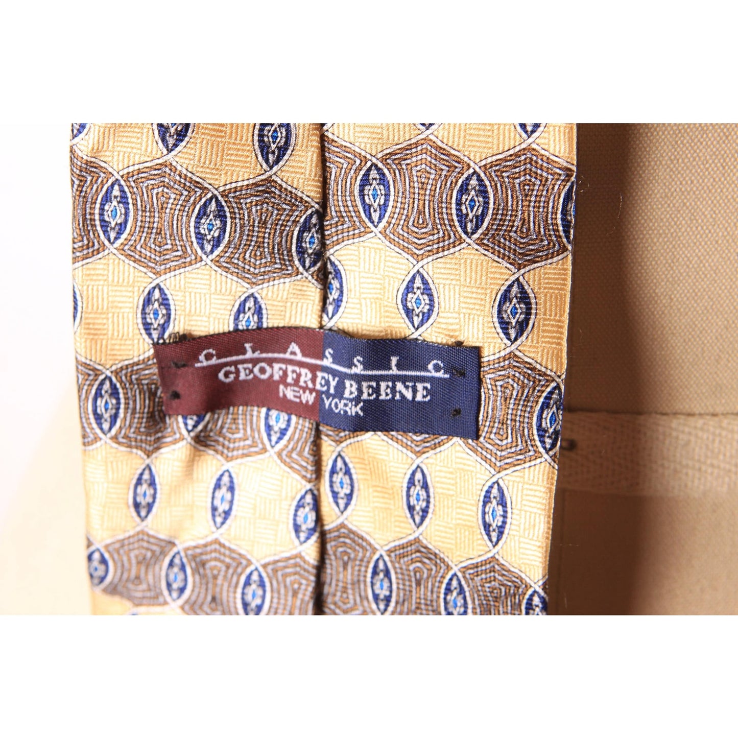 1990s Tan and Brown Patterned Necktie by Geoffrey Beene