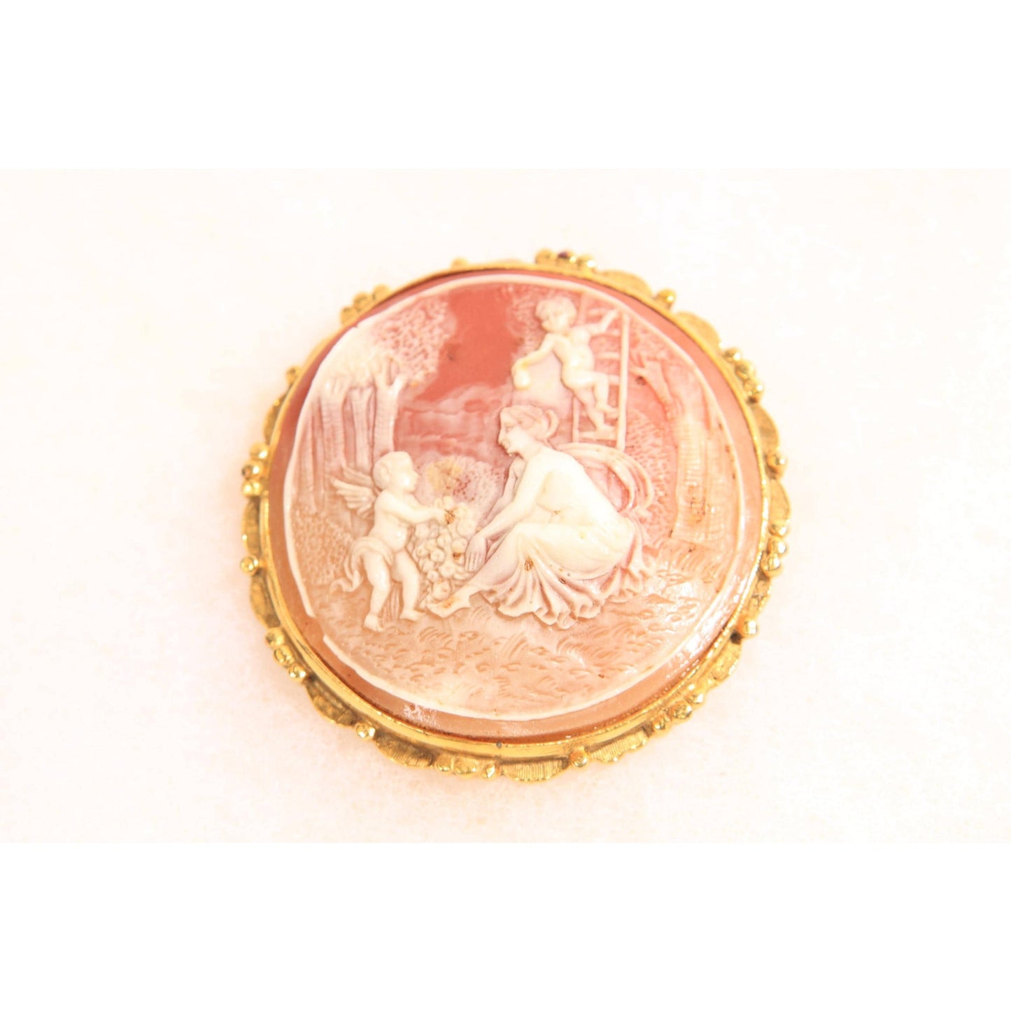 1960s 1970s Peach Pink and Cream Gold Tone Metal Cameo Woman and Cherub Cameo Brooch