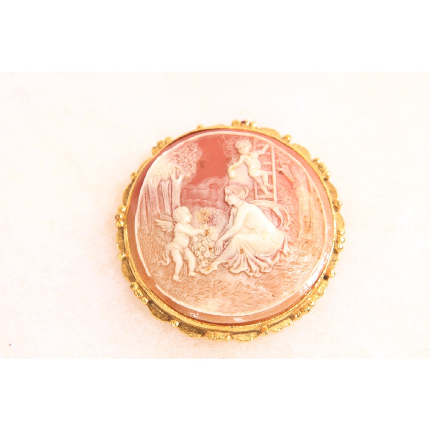 1960s 1970s Peach Pink and Cream Gold Tone Metal Cameo Woman and Cherub Cameo Brooch