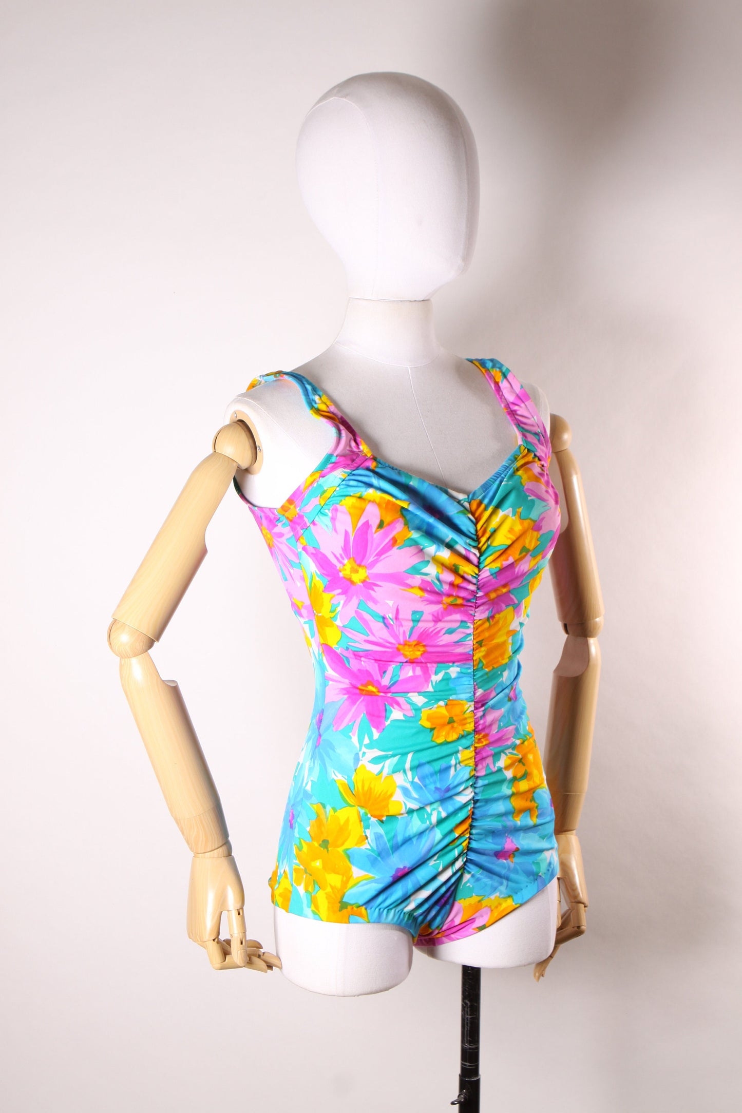 Late 1970s Early 1980s Blue, Pink and Orange Floral Ruched One Piece Swimsuit by Maxine of Hollywood -M-L