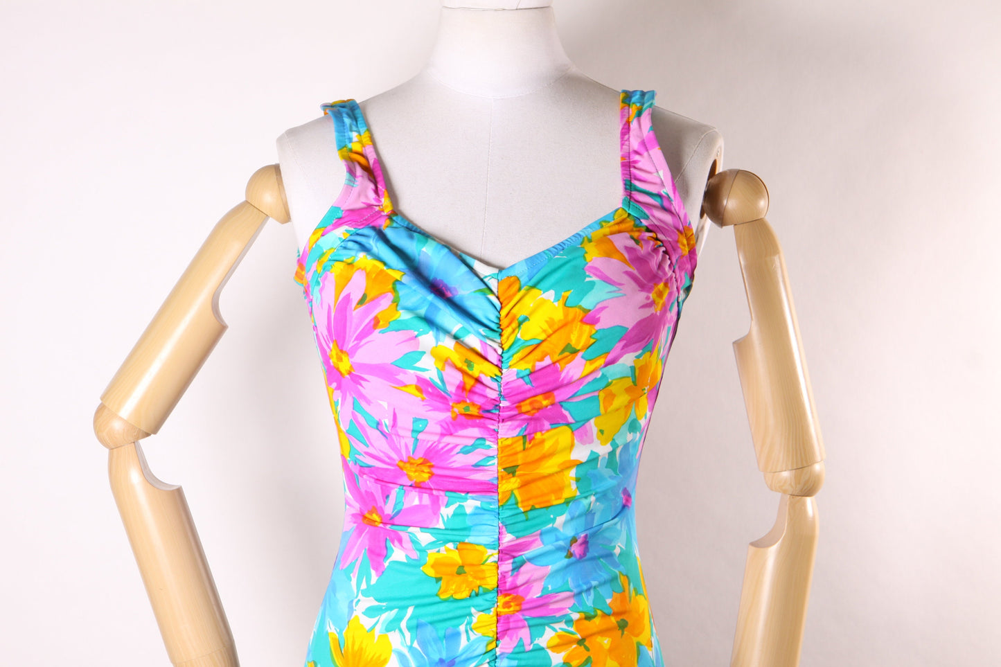 Late 1970s Early 1980s Blue, Pink and Orange Floral Ruched One Piece Swimsuit by Maxine of Hollywood -M-L