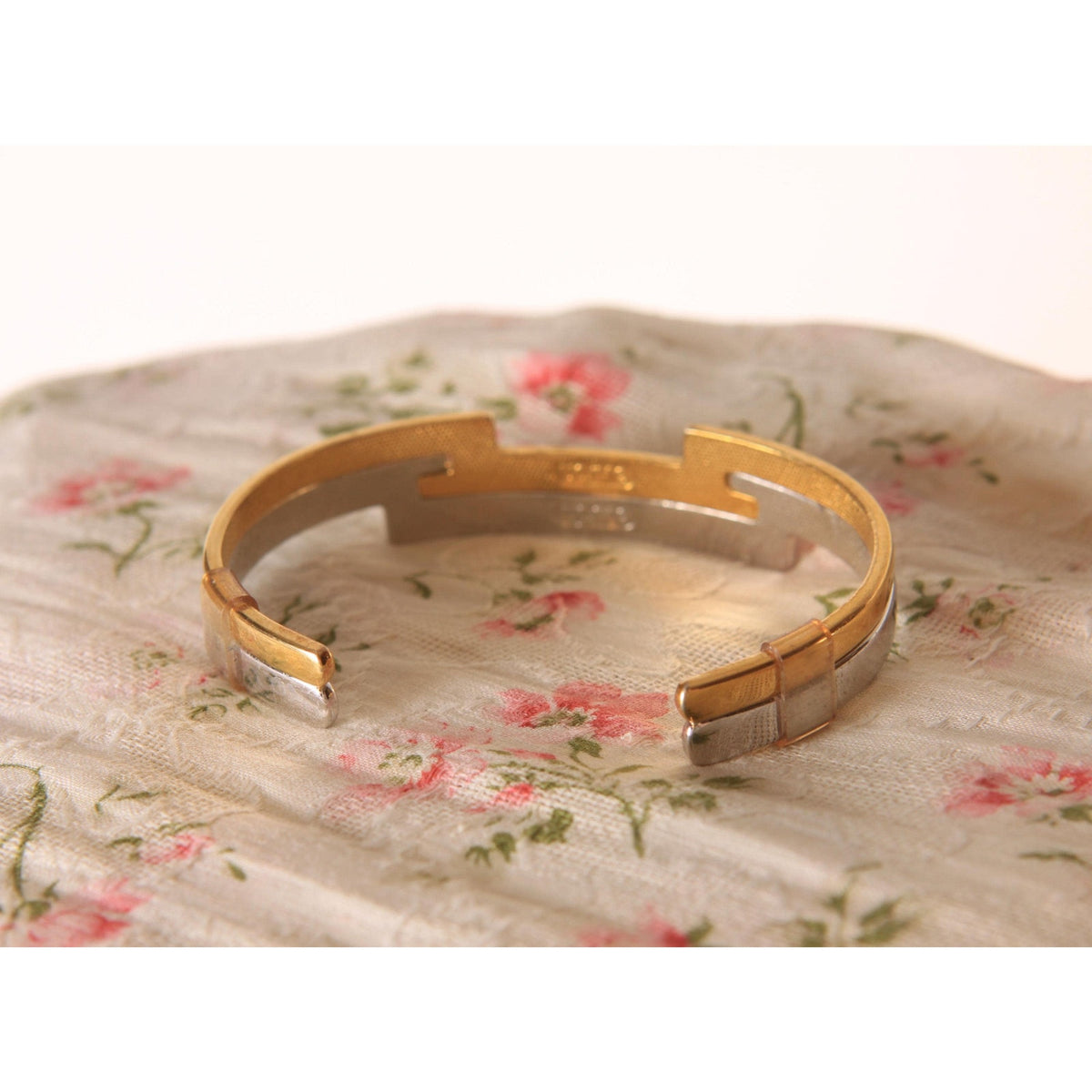 Late 1970s Early 1980s Silver Tone and Gold Tone Metal Art Deco Style Cuff Bracelet by Avon