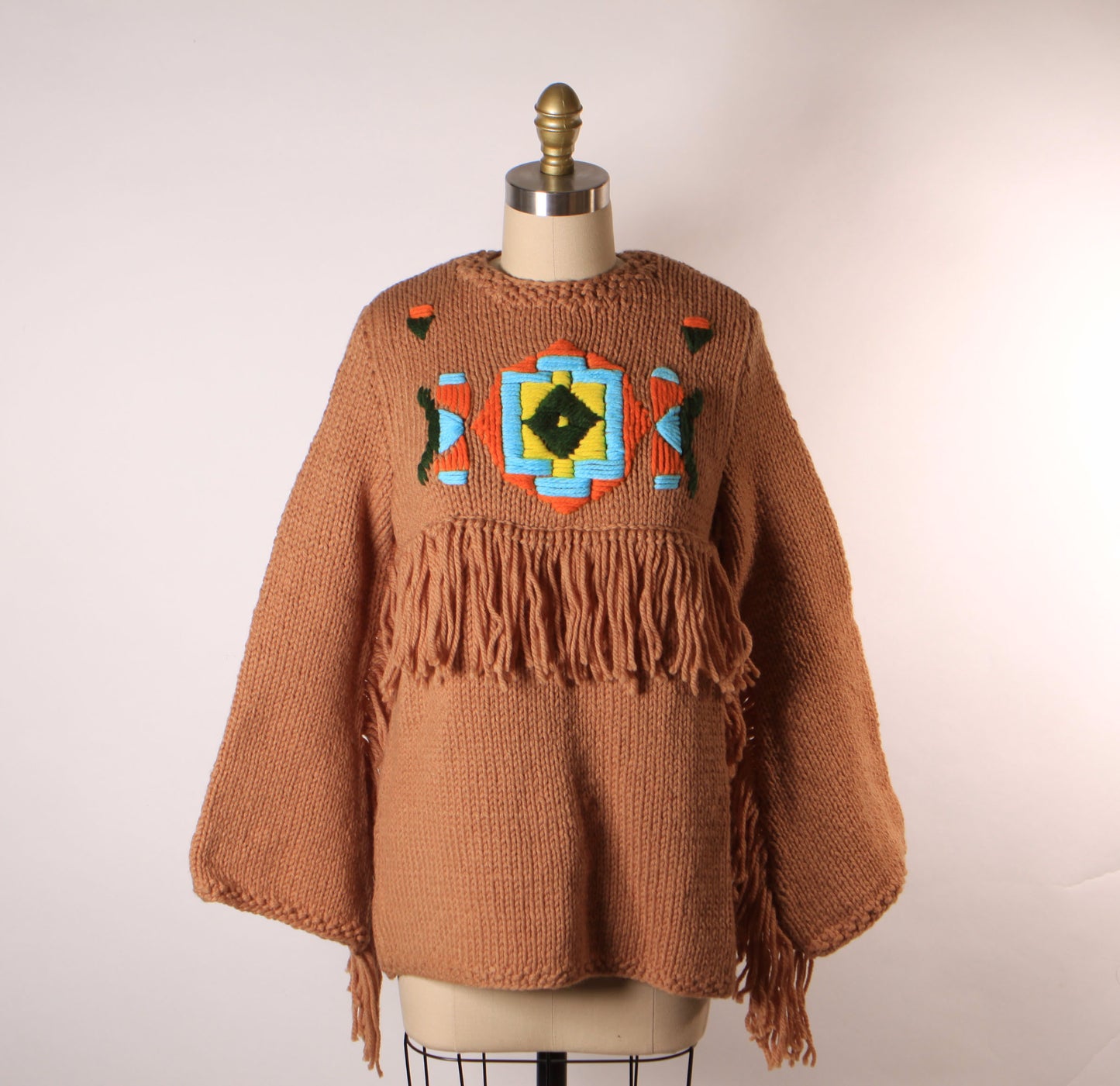 Late 1960s Early 1970s Tan, Blue, Black and Yellow Western Native American Fringe Sleeve Knit Sweater