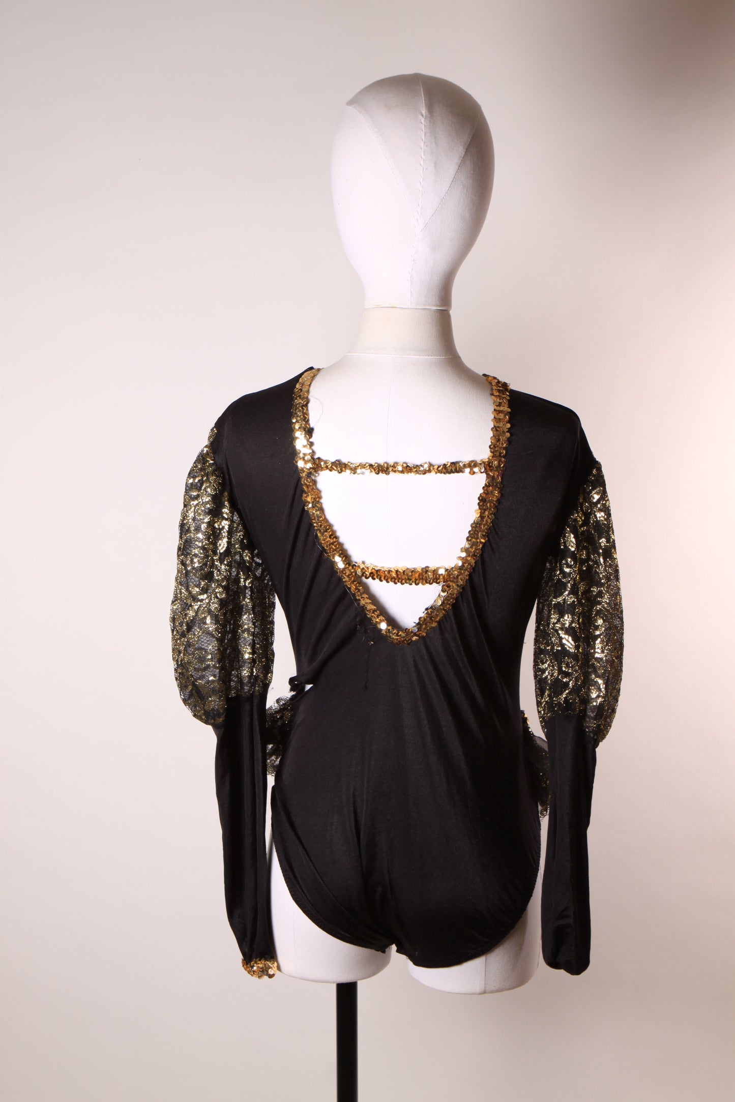 1980s Black and Gold Metallic Long Sleeve Sequin Trim One Piece Costume Showgirl Leotard with Matching Sheer Lace Over Skirt -M-L