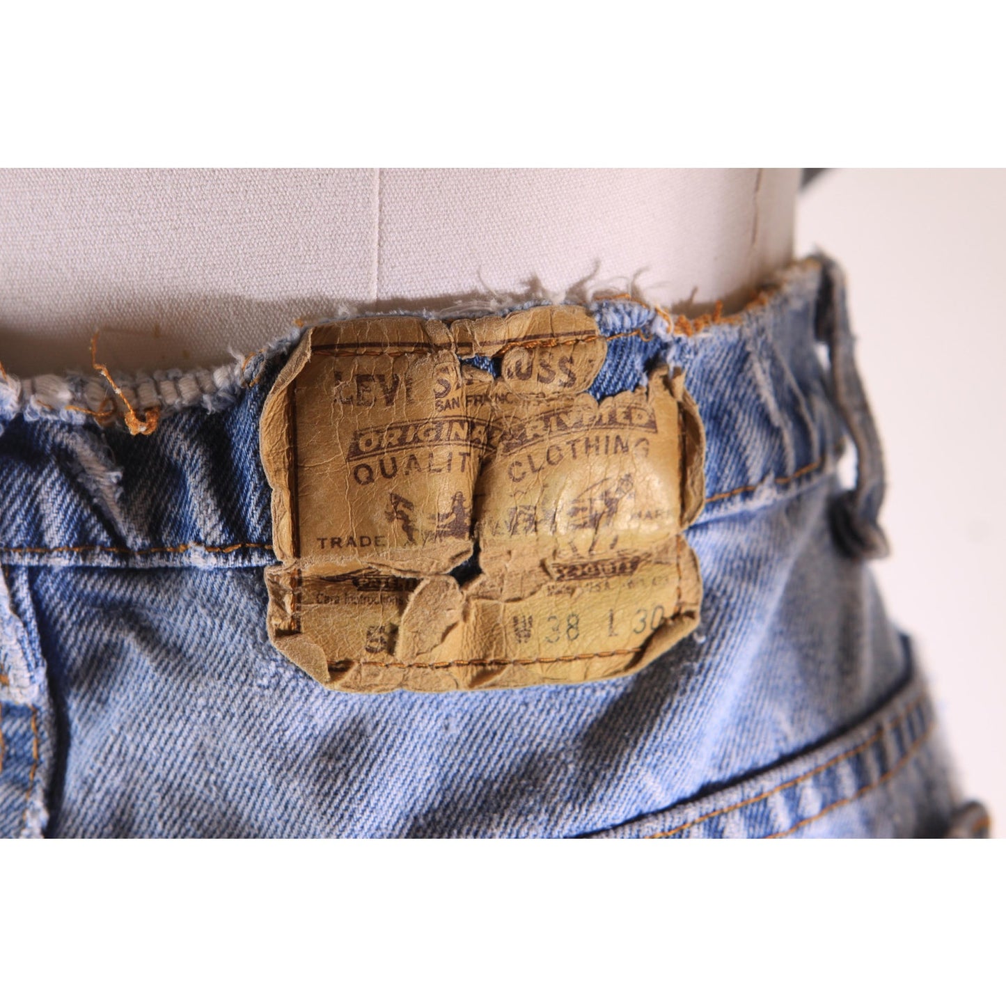 1980s Distressed Patch Fraying Blue Denim Orange Tab 517 Jeans by Levi's -38x30