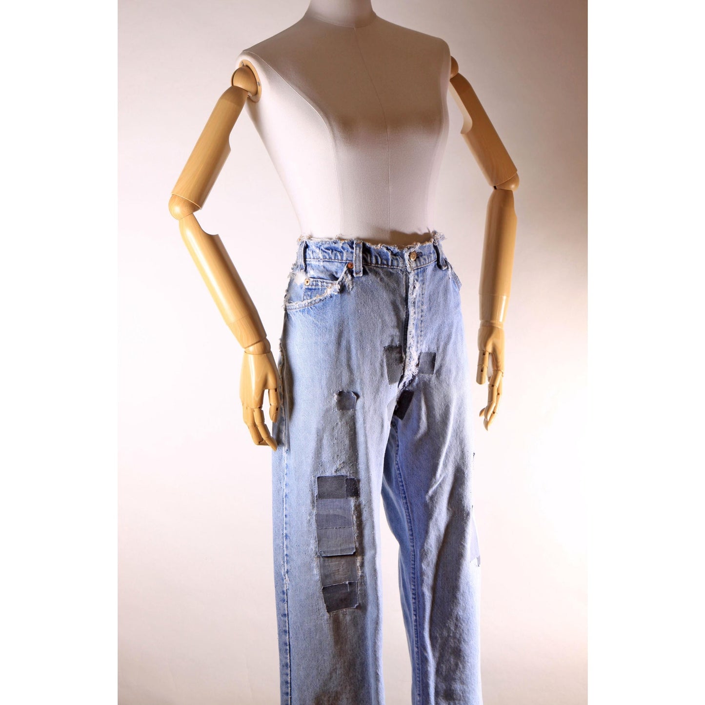 1980s Distressed Patch Fraying Blue Denim Orange Tab 517 Jeans by Levi's -38x30
