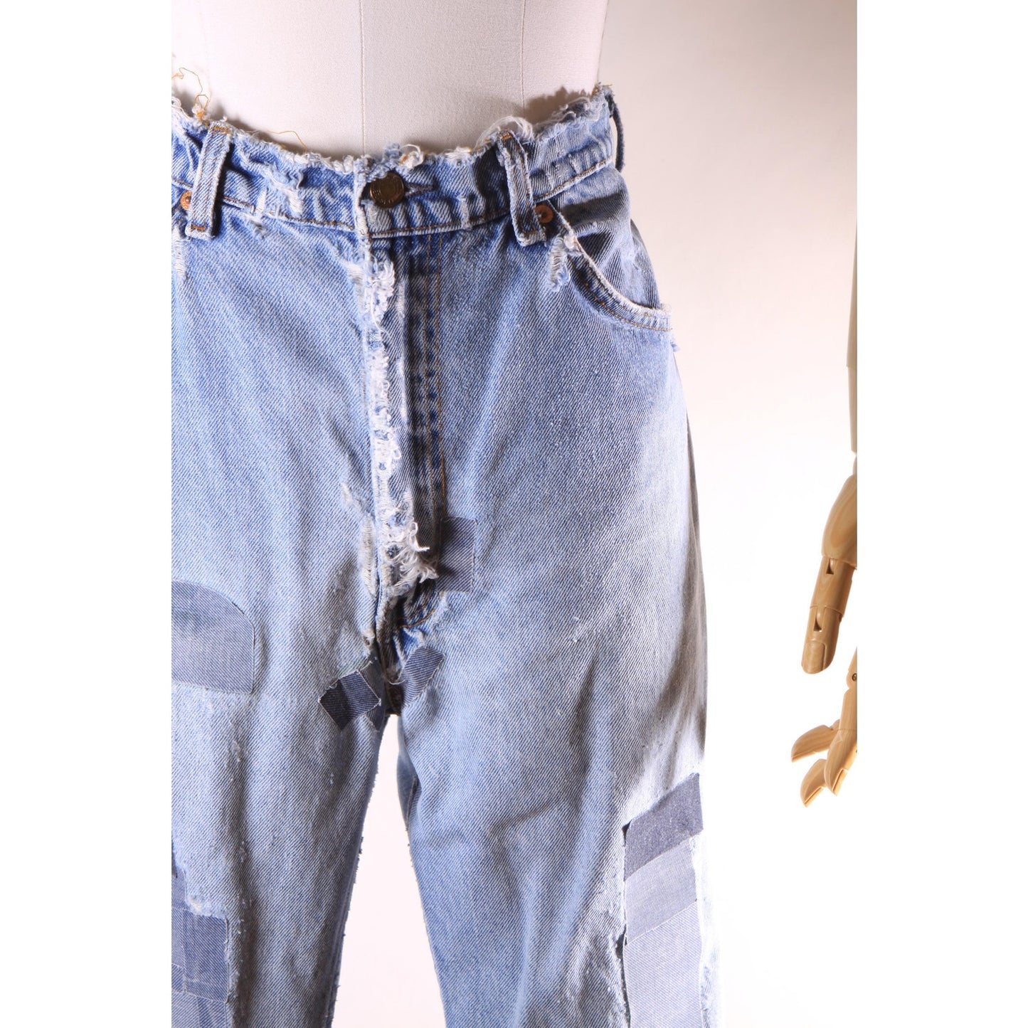 1980s Distressed Patch Fraying Blue Denim Orange Tab 517 Jeans by Levi's -38x30