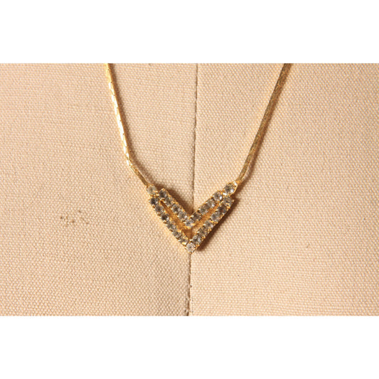 1970s Gold Tone Metal V Shape Pendant Rhinestone Faux Stone Necklace
