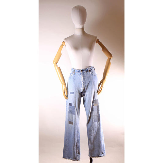 1980s Distressed Patch Fraying Blue Denim Orange Tab 517 Jeans by Levi's -38x30
