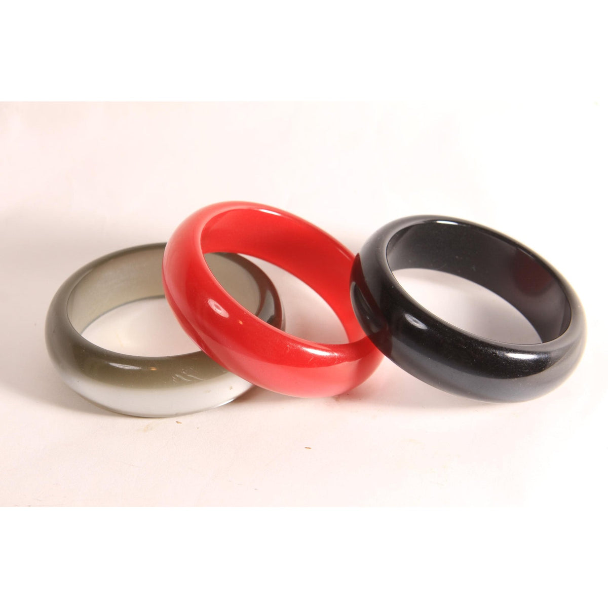 1970s 1980s Dark Red, Black and Gray Pearlescent Thick Plastic Stack of Bangle Bracelets