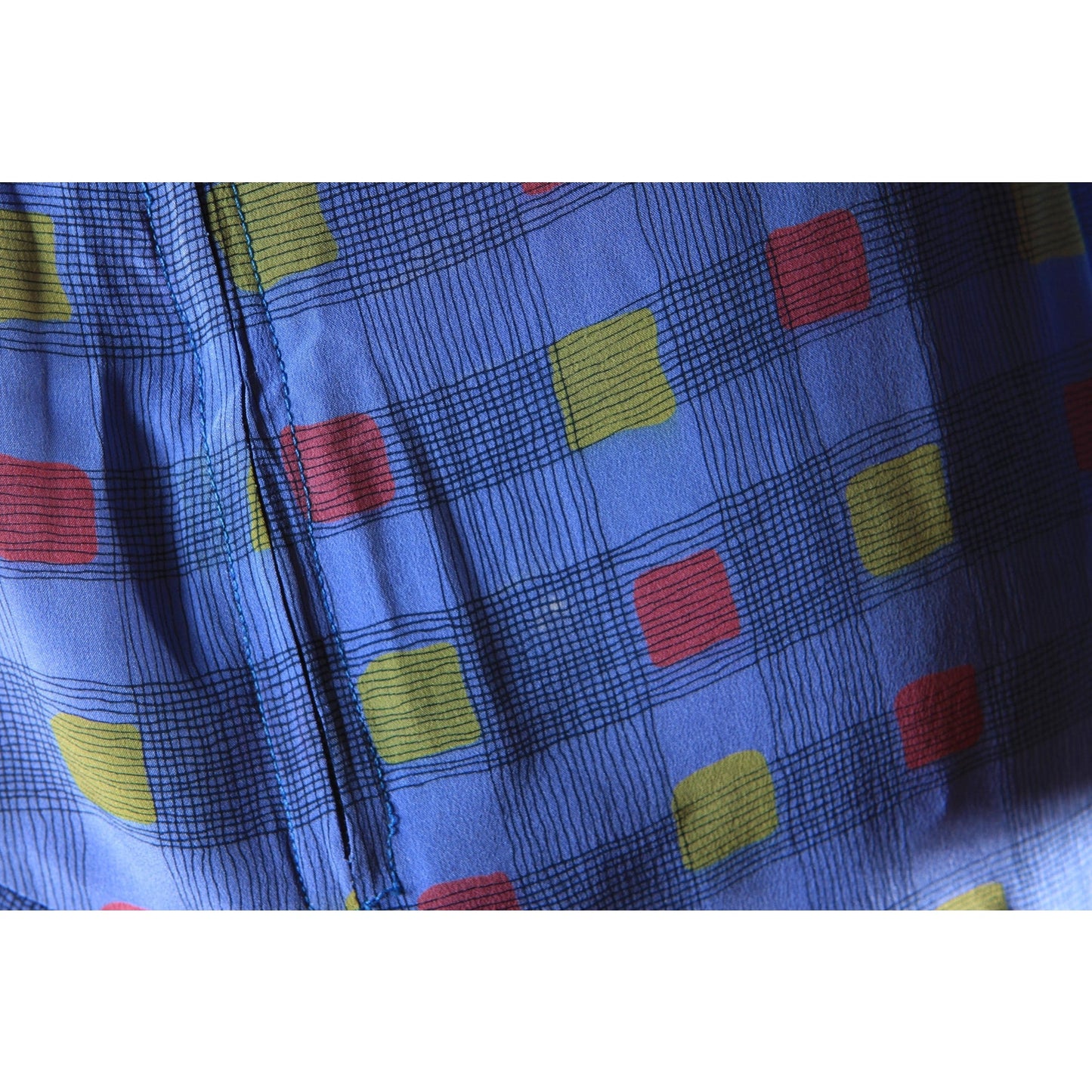 1970s Long Sleeve Blue, Black, Red and Yellow Asymmetrical Drop Waist V Neck Geometric Plaid Dress by Valentino