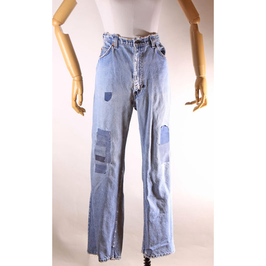 1980s Distressed Patch Fraying Blue Denim Orange Tab 517 Jeans by Levi's -38x30