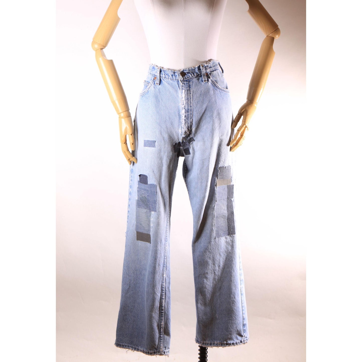 1980s Distressed Patch Fraying Blue Denim Orange Tab 517 Jeans by Levi's -38x30