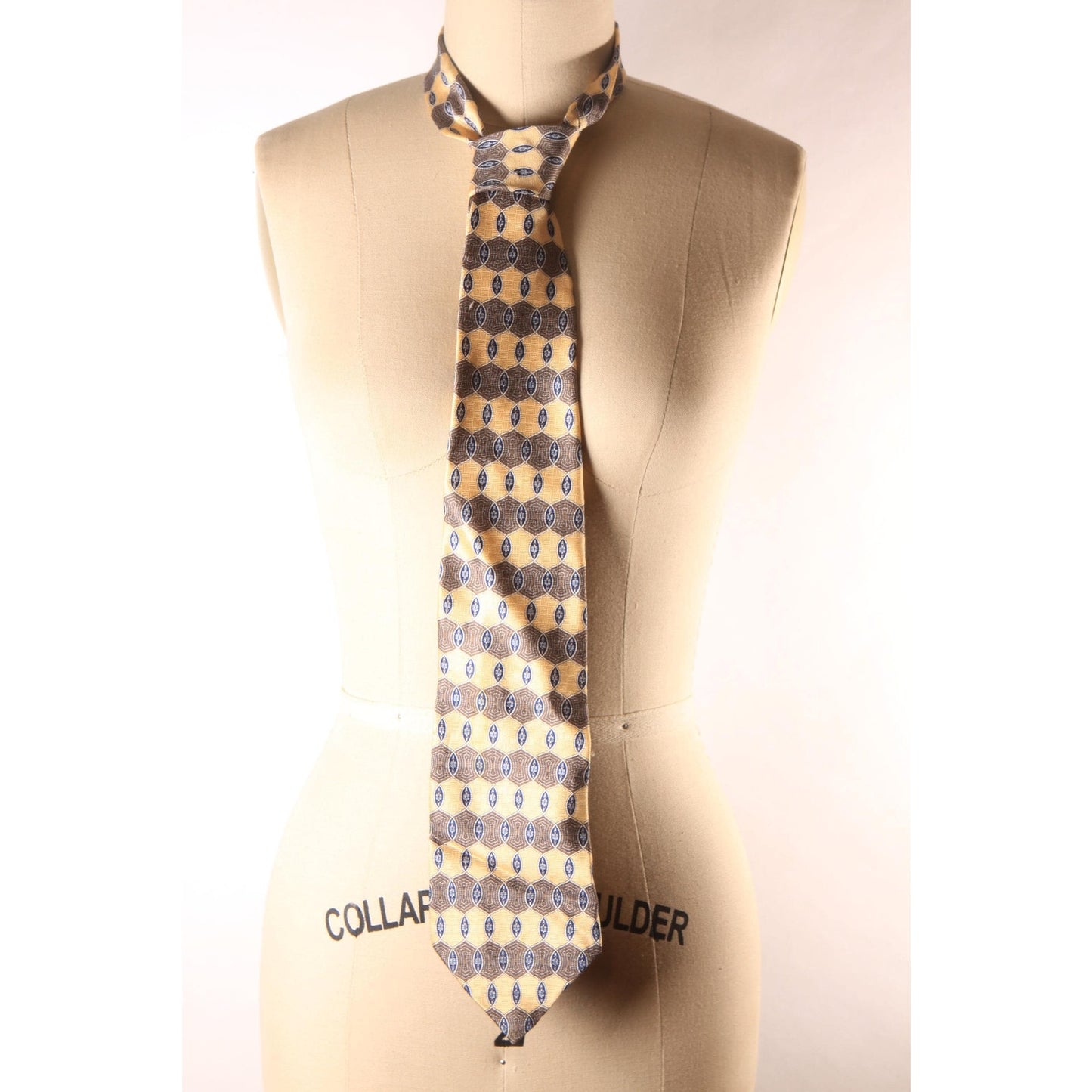1990s Tan and Brown Patterned Necktie by Geoffrey Beene