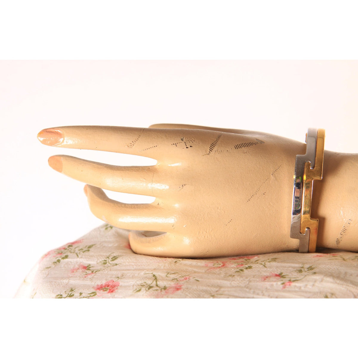 Late 1970s Early 1980s Silver Tone and Gold Tone Metal Art Deco Style Cuff Bracelet by Avon