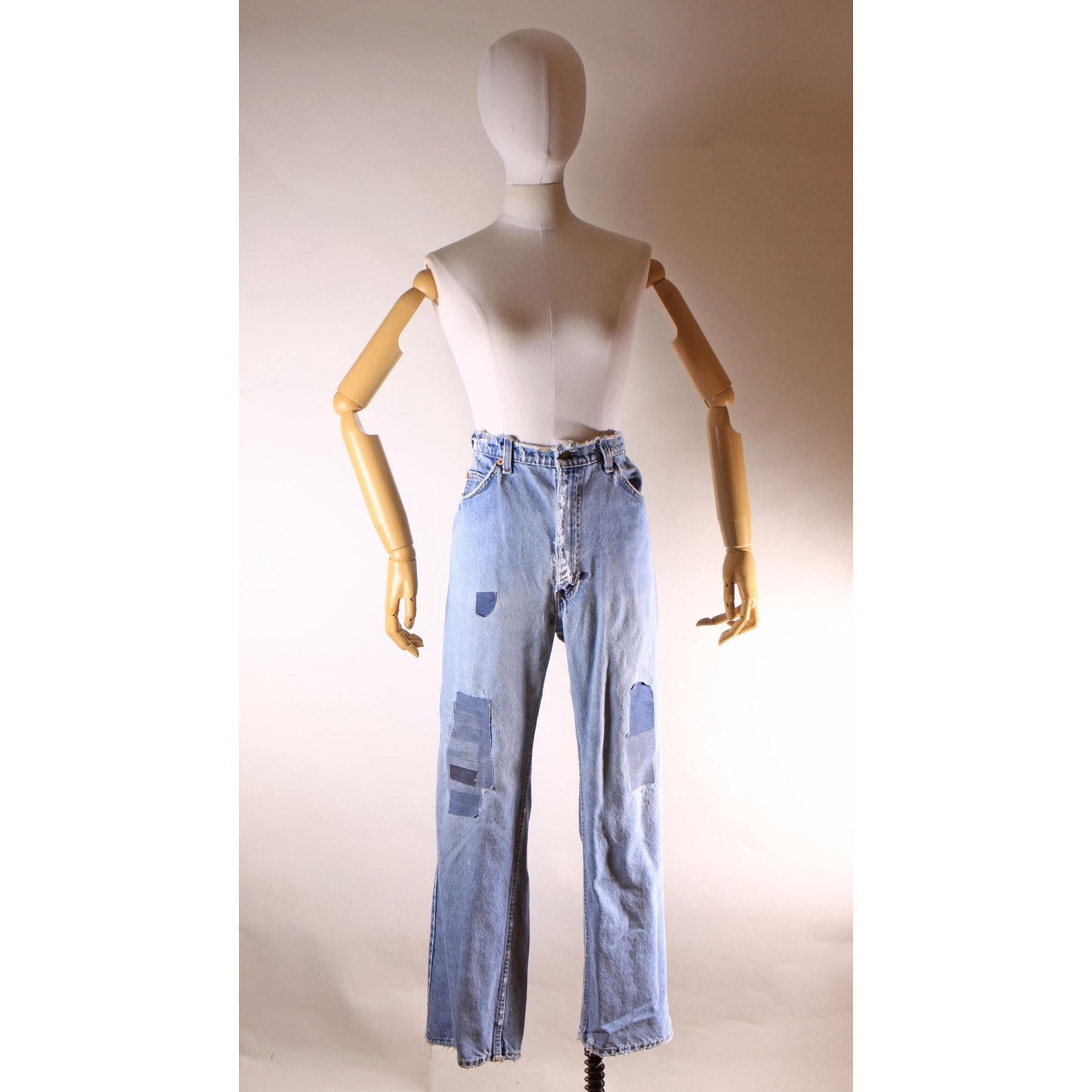 1980s Distressed Patch Fraying Blue Denim Orange Tab 517 Jeans by Levi's -38x30