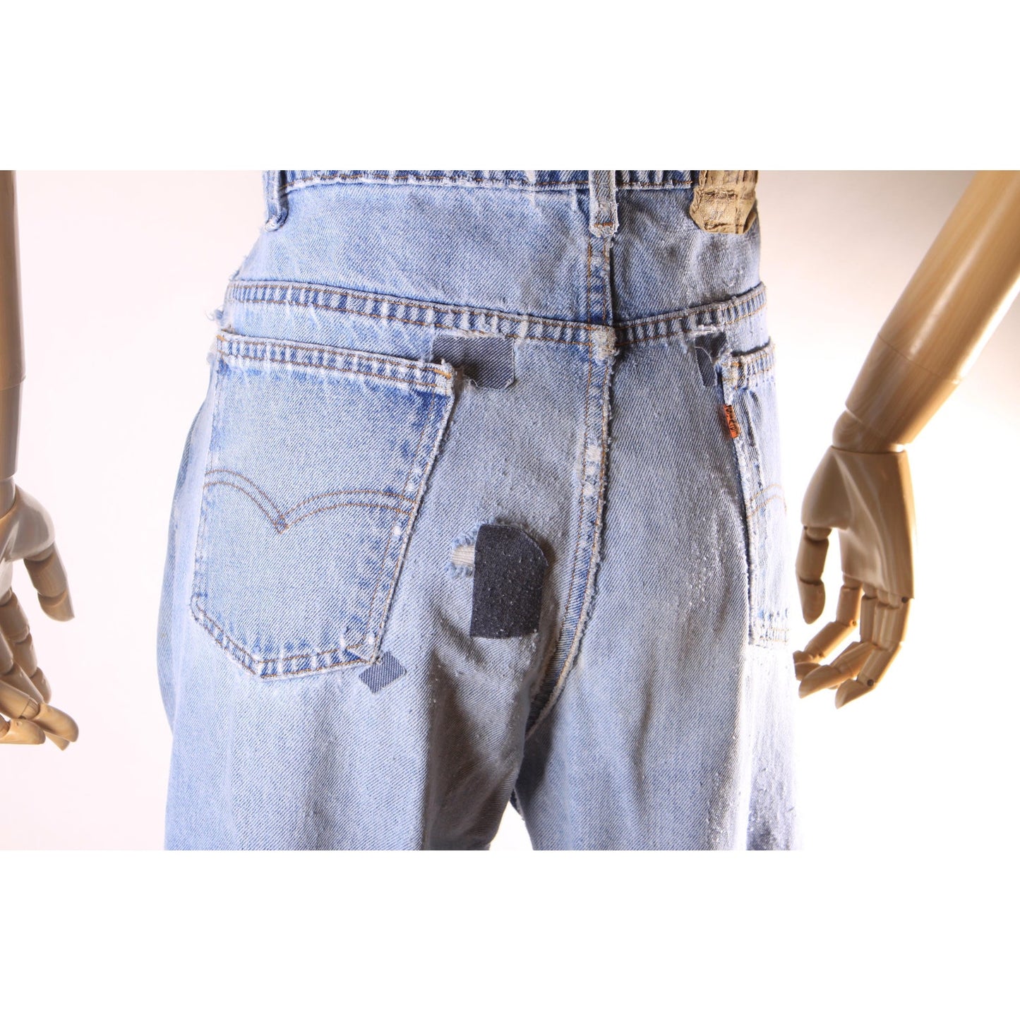 1980s Distressed Patch Fraying Blue Denim Orange Tab 517 Jeans by Levi's -38x30