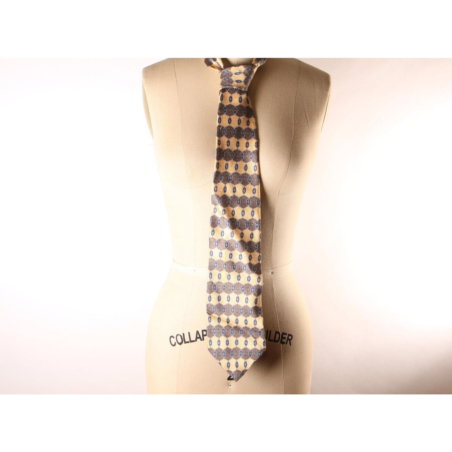 1990s Tan and Brown Patterned Necktie by Geoffrey Beene