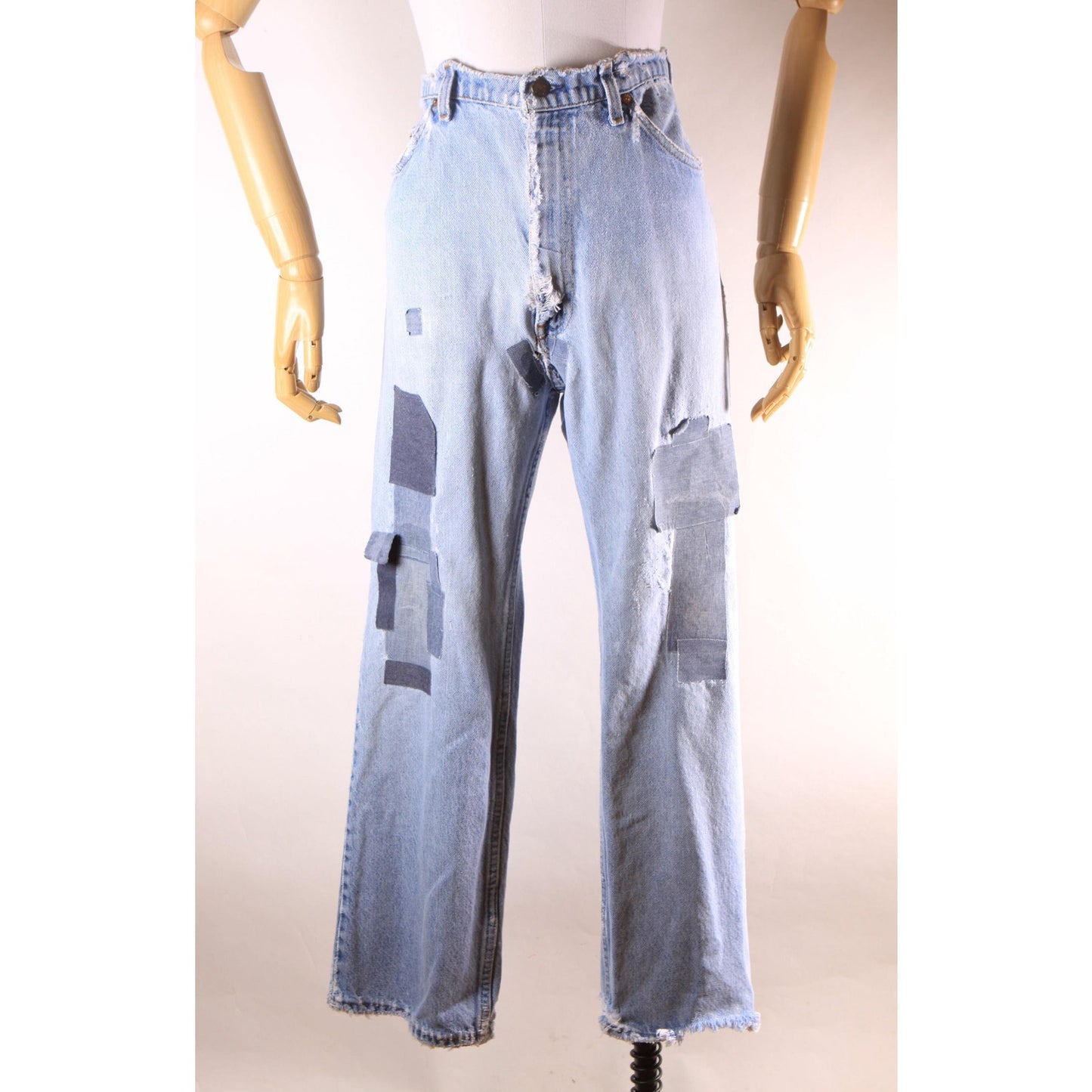 1980s Distressed Patch Fraying Blue Denim Orange Tab 517 Jeans by Levi's -38x30