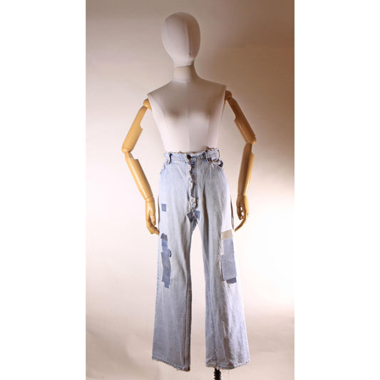 1980s Distressed Patch Fraying Blue Denim Orange Tab 517 Jeans by Levi's -38x29