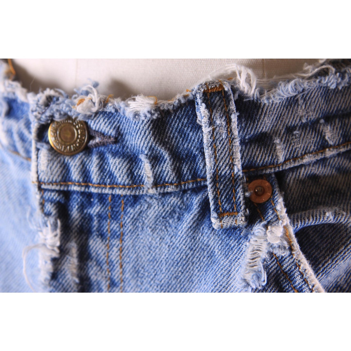 1980s Distressed Patch Fraying Blue Denim Orange Tab 517 Jeans by Levi's -38x30