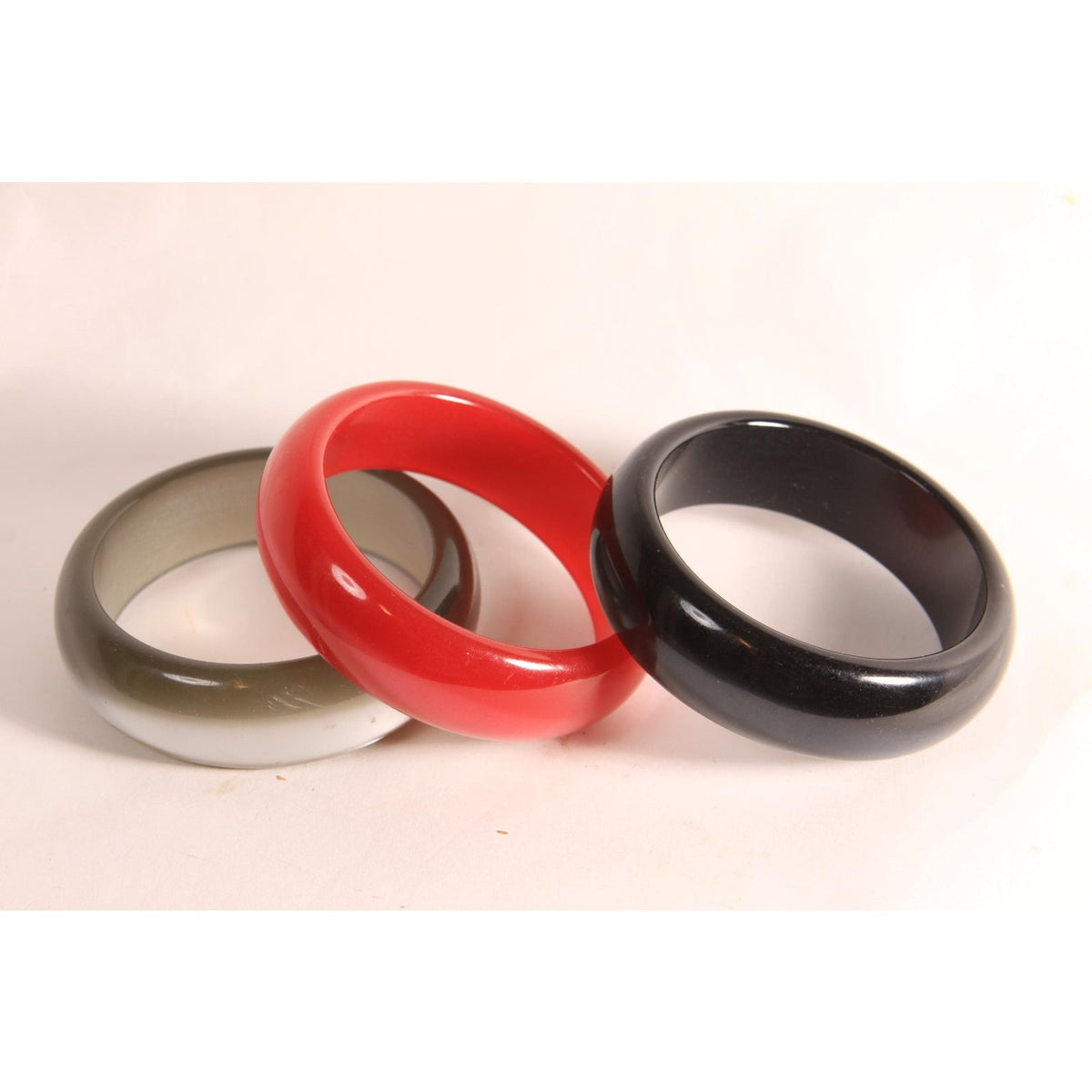 1970s 1980s Dark Red, Black and Gray Pearlescent Thick Plastic Stack of Bangle Bracelets