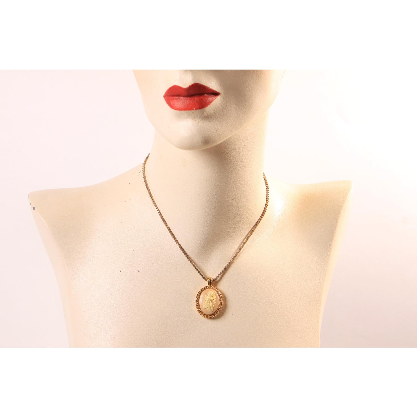 1970s Gold Tone Metal Pink and Cream Cherub Cameo Pendant Necklace