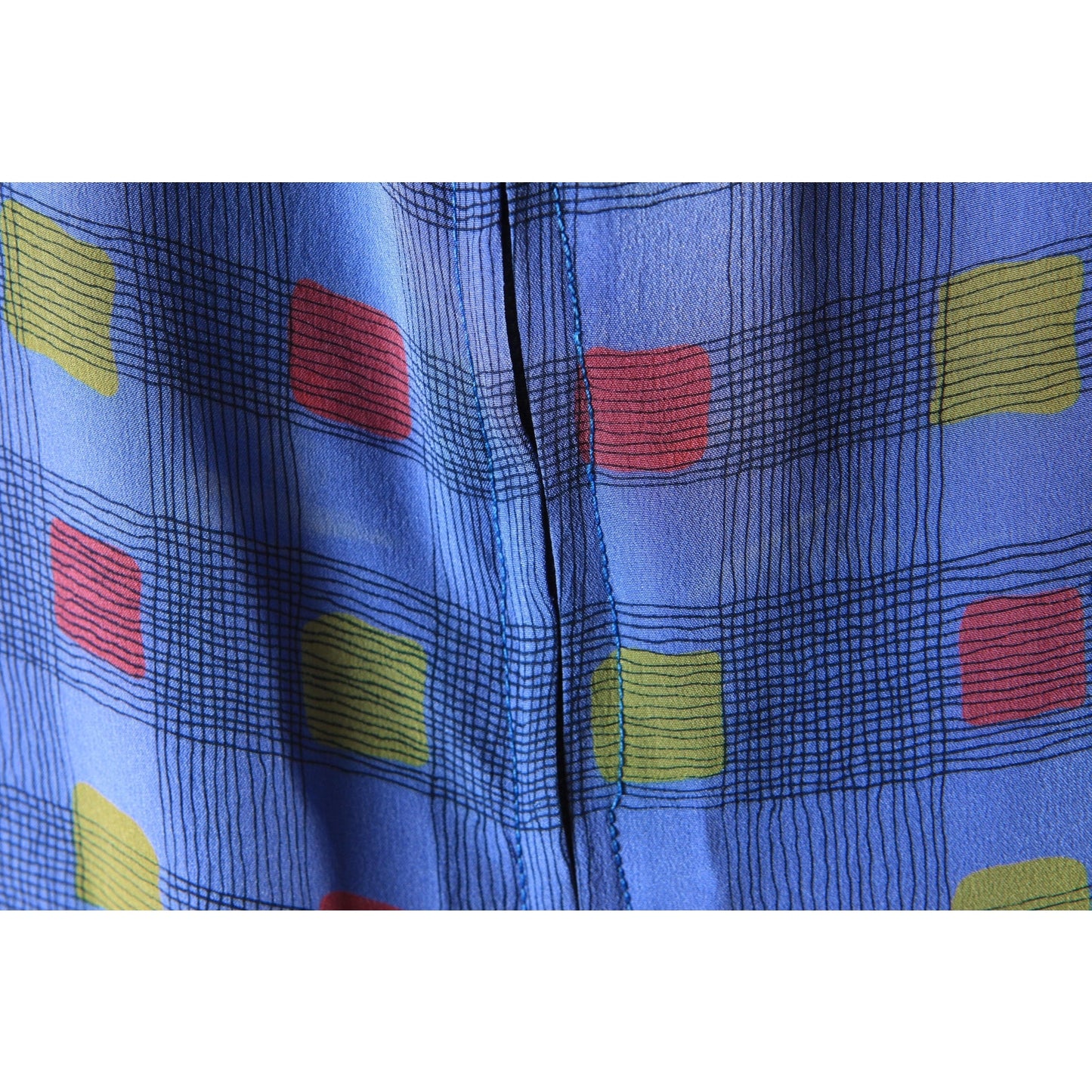 1970s Long Sleeve Blue, Black, Red and Yellow Asymmetrical Drop Waist V Neck Geometric Plaid Dress by Valentino