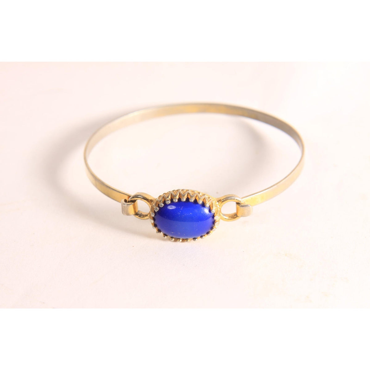 1970s Silver Tone and Gold Tone Metal Blue Faux Stone Bracelet by Avon