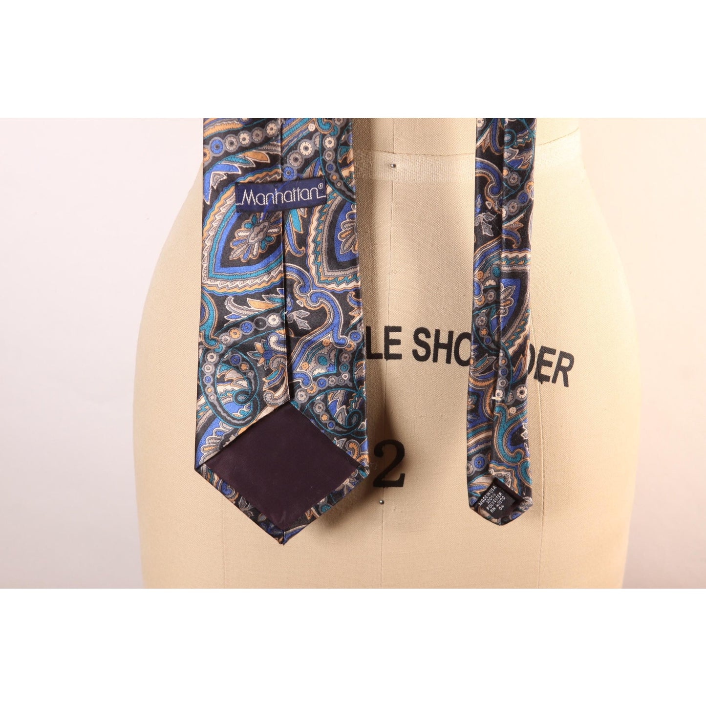 1980s Blue and Tan Paisley Print Necktie Tie by Manhattan