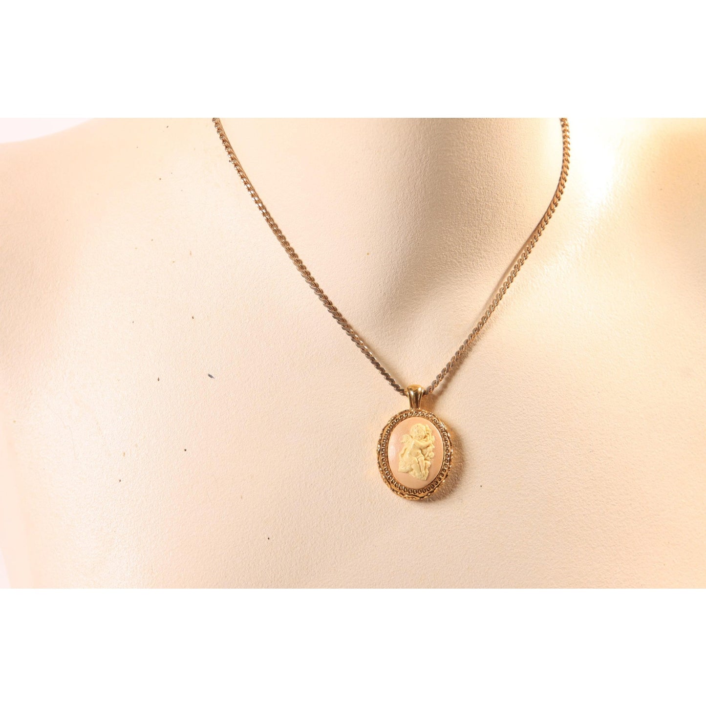 1970s Gold Tone Metal Pink and Cream Cherub Cameo Pendant Necklace