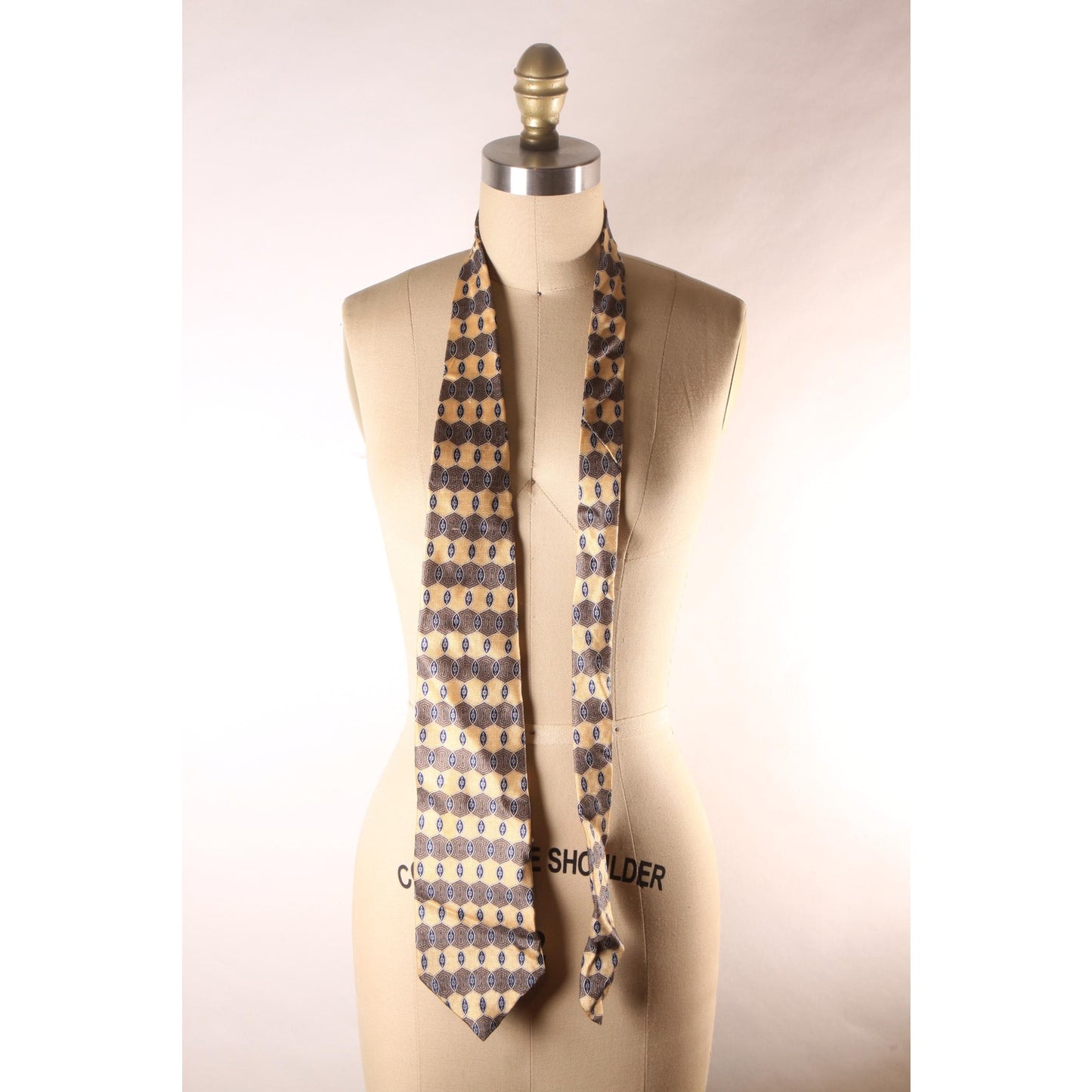1990s Tan and Brown Patterned Necktie by Geoffrey Beene