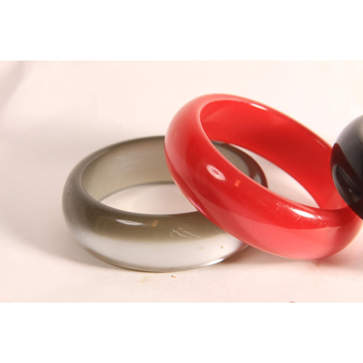 1970s 1980s Dark Red, Black and Gray Pearlescent Thick Plastic Stack of Bangle Bracelets