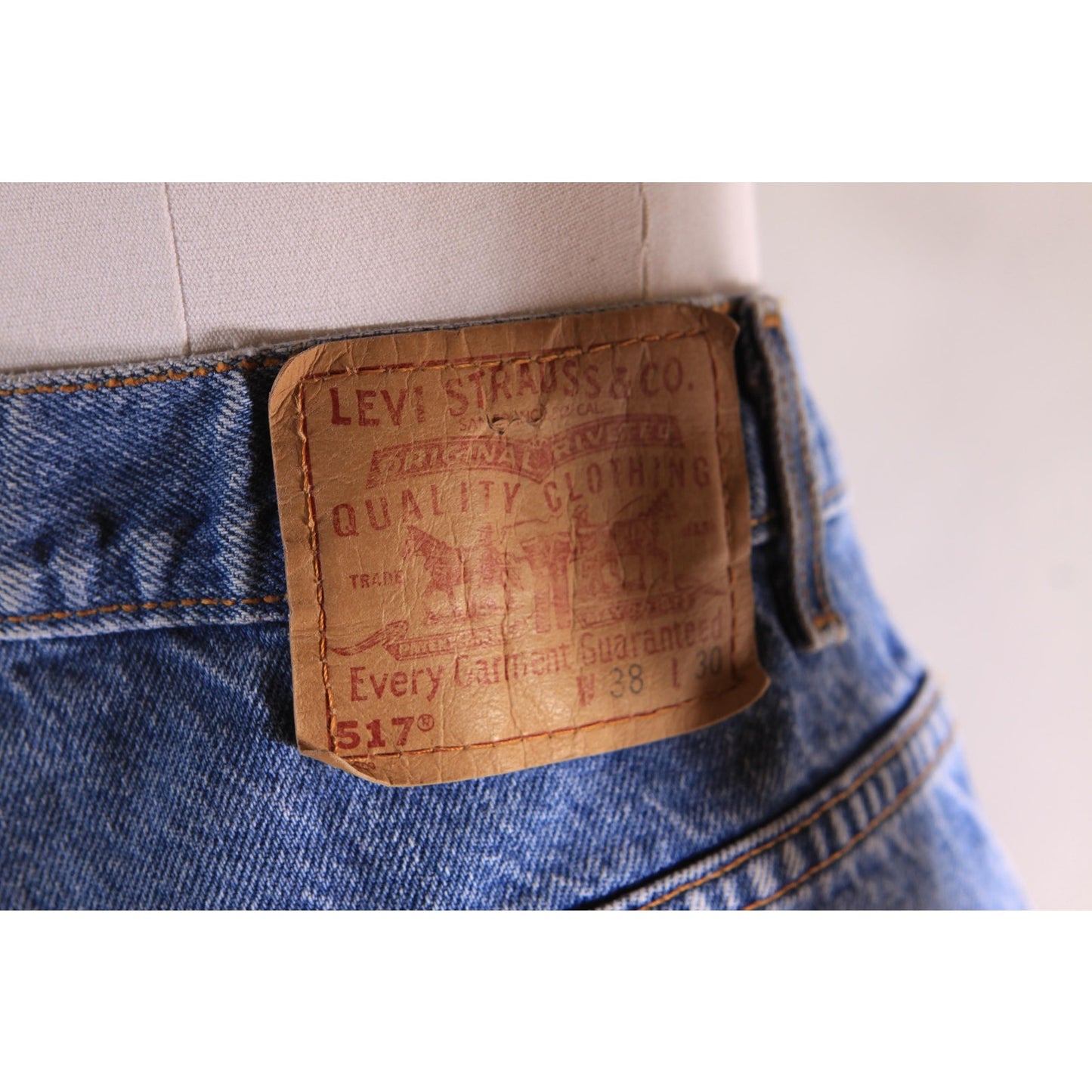 1990s Blue Denim Blank Red Tab 517 Boot Cut Mens Jeans by Levi's- 38x30