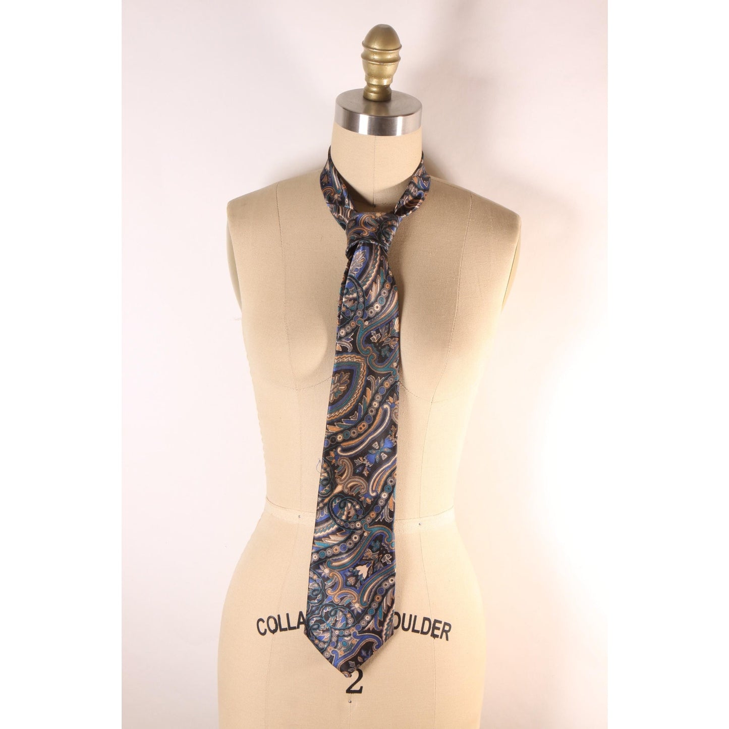 1980s Blue and Tan Paisley Print Necktie Tie by Manhattan