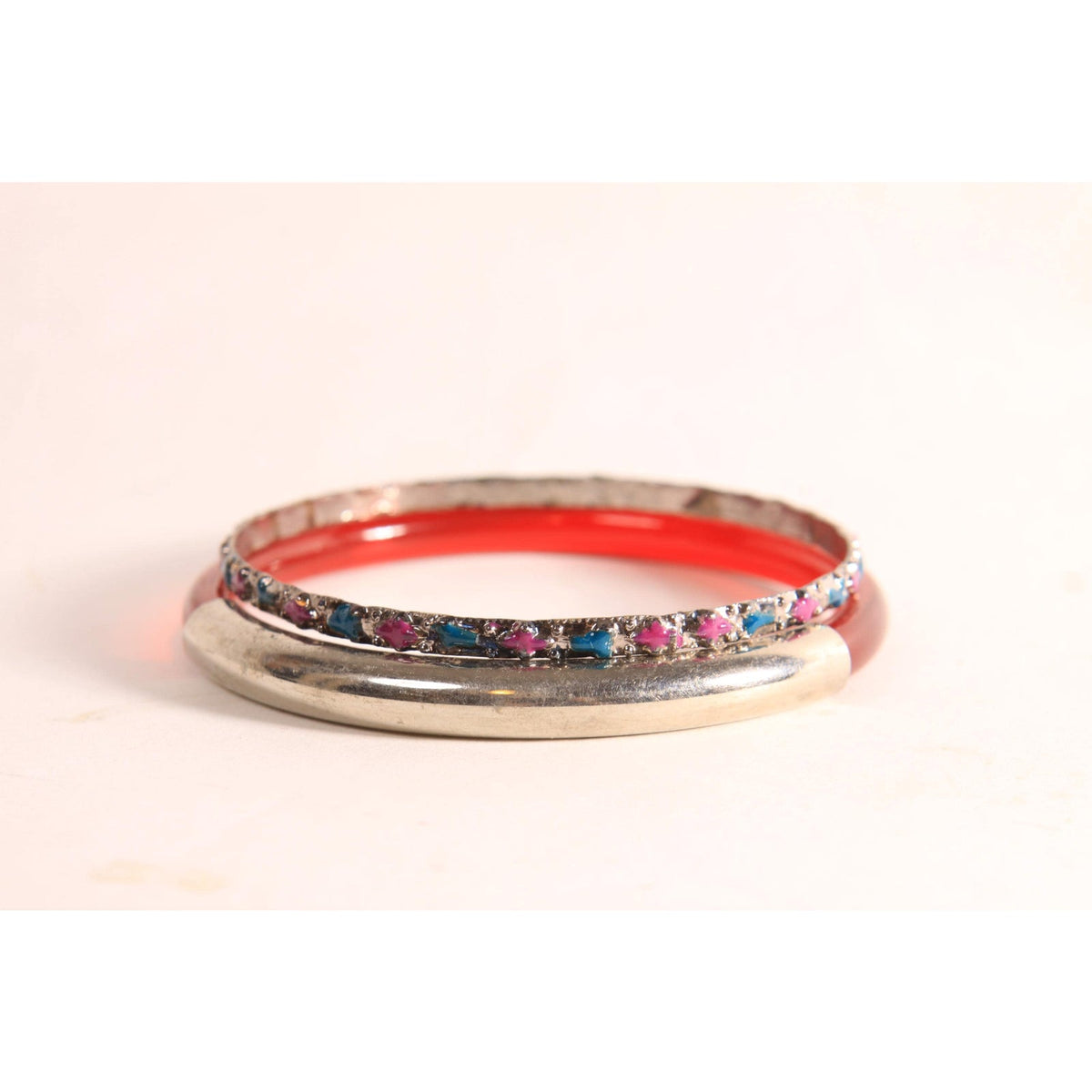 1970s 1980s Dark Red and Silver Tone Metal and Plastic and Metal Hot Pink and Blue Stack of Bangle Bracelets