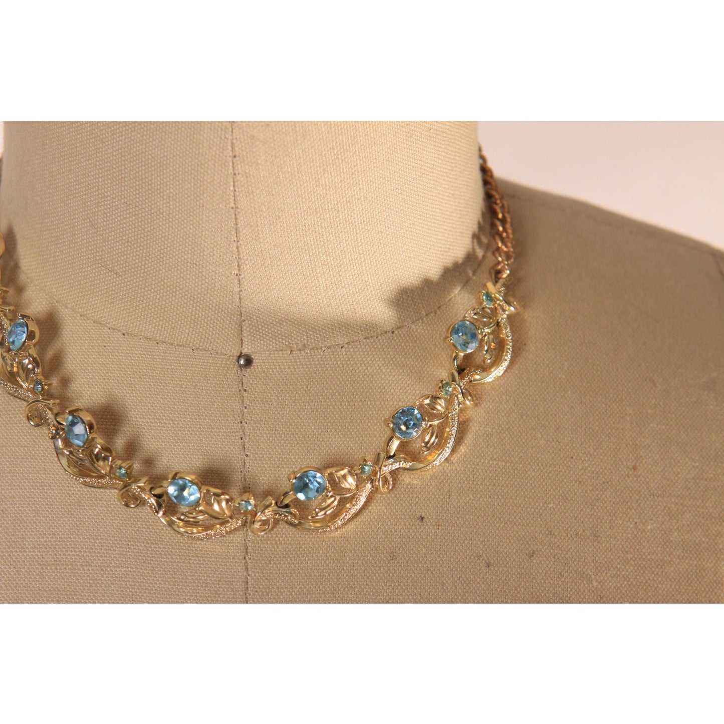 1950s Silver Tone and Blue Stone Floral Swirl Formal Necklace by Lisner