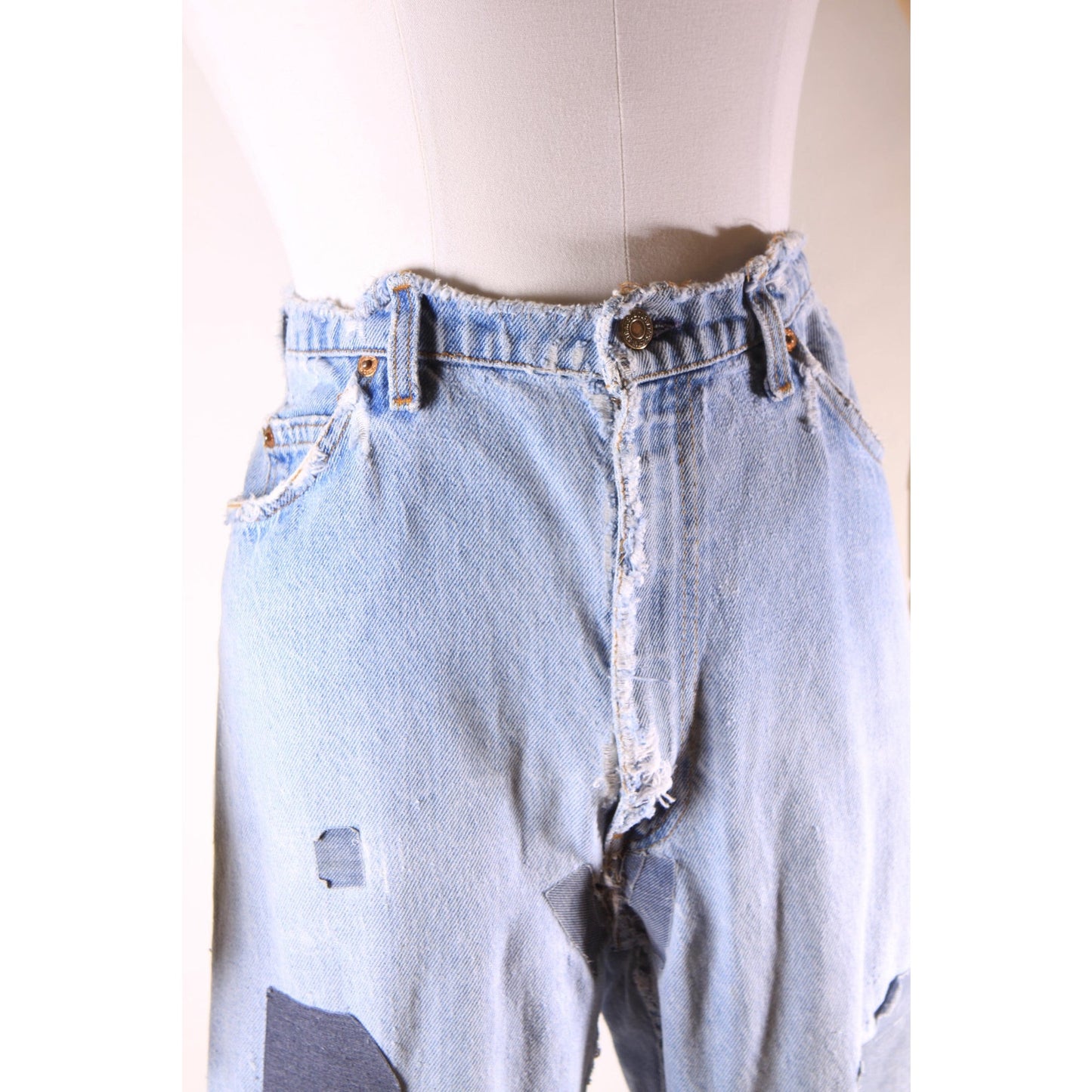 1980s Distressed Patch Fraying Blue Denim Orange Tab 517 Jeans by Levi's -38x30