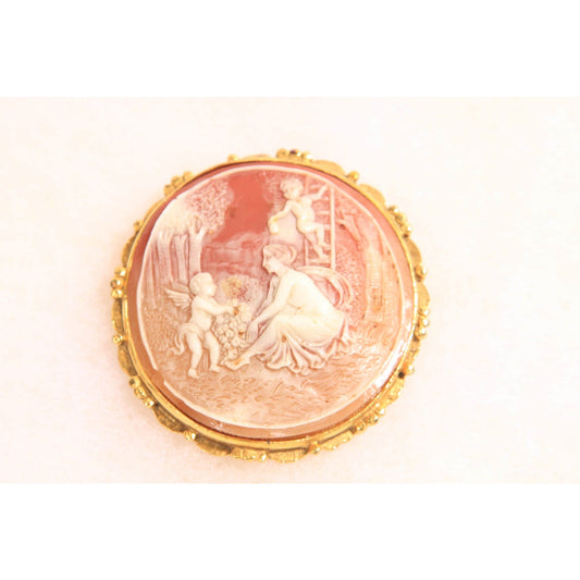 1960s 1970s Peach Pink and Cream Gold Tone Metal Cameo Woman and Cherub Cameo Brooch