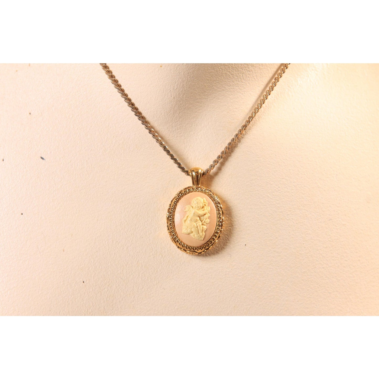 1970s Gold Tone Metal Pink and Cream Cherub Cameo Pendant Necklace