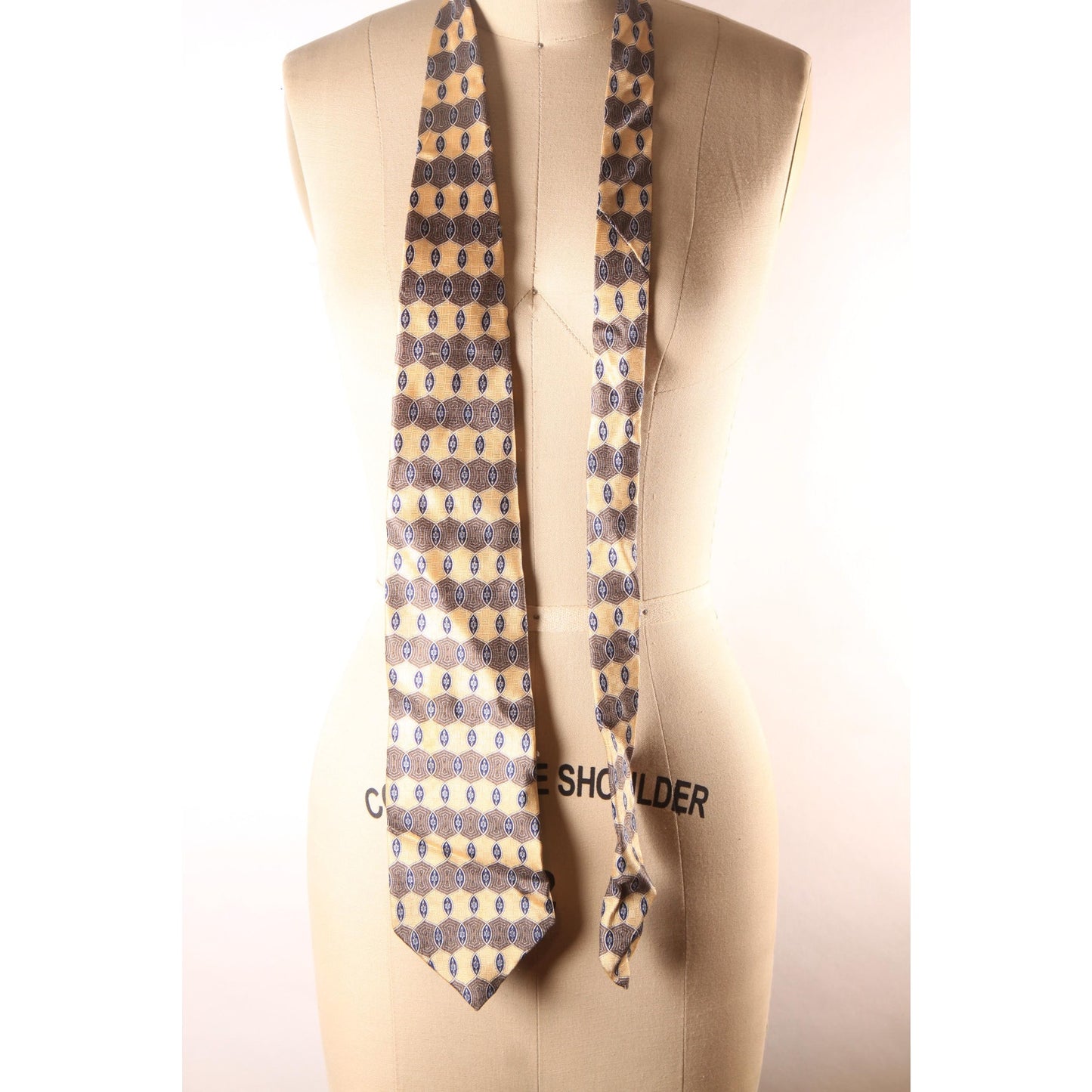 1990s Tan and Brown Patterned Necktie by Geoffrey Beene