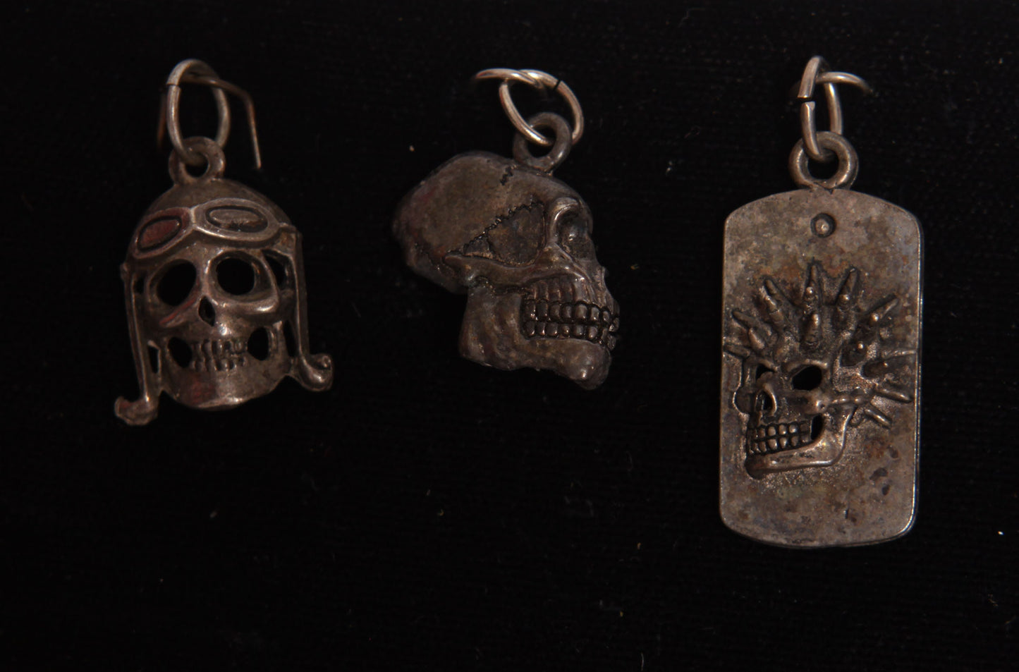 Deadstock 1980s Novelty Motorcycle Biker Pewter Skulls and Skeleton Hand Pendants