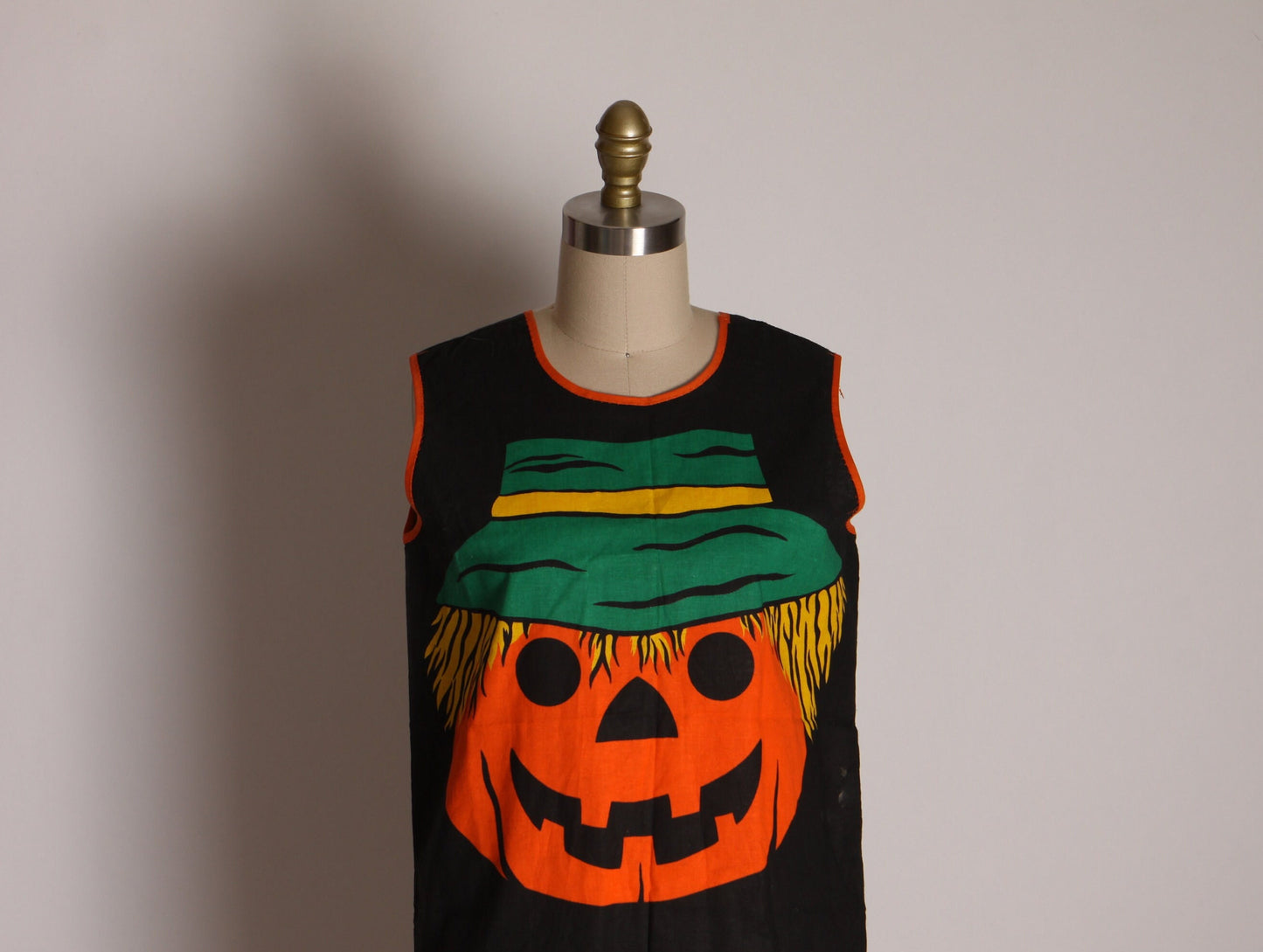 1970s Black, Orange, Green and Yellow Sleeveless Pullover Jack-o-Lantern Halloween Shirt Costume -S