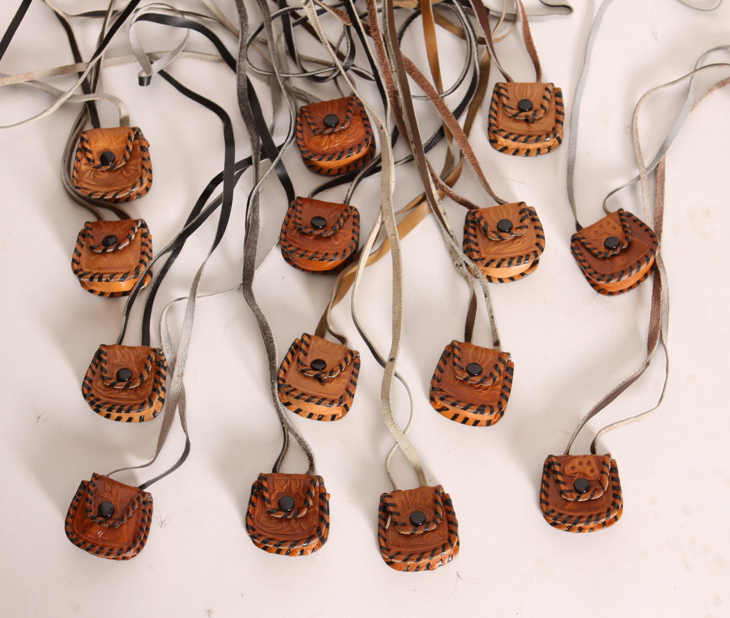 Deadstock 1970s Leather Tooled Cord Mushroom, Bird, Apple, Mouse and Floral Medicine Bag Leather Necklace Snap Pouch