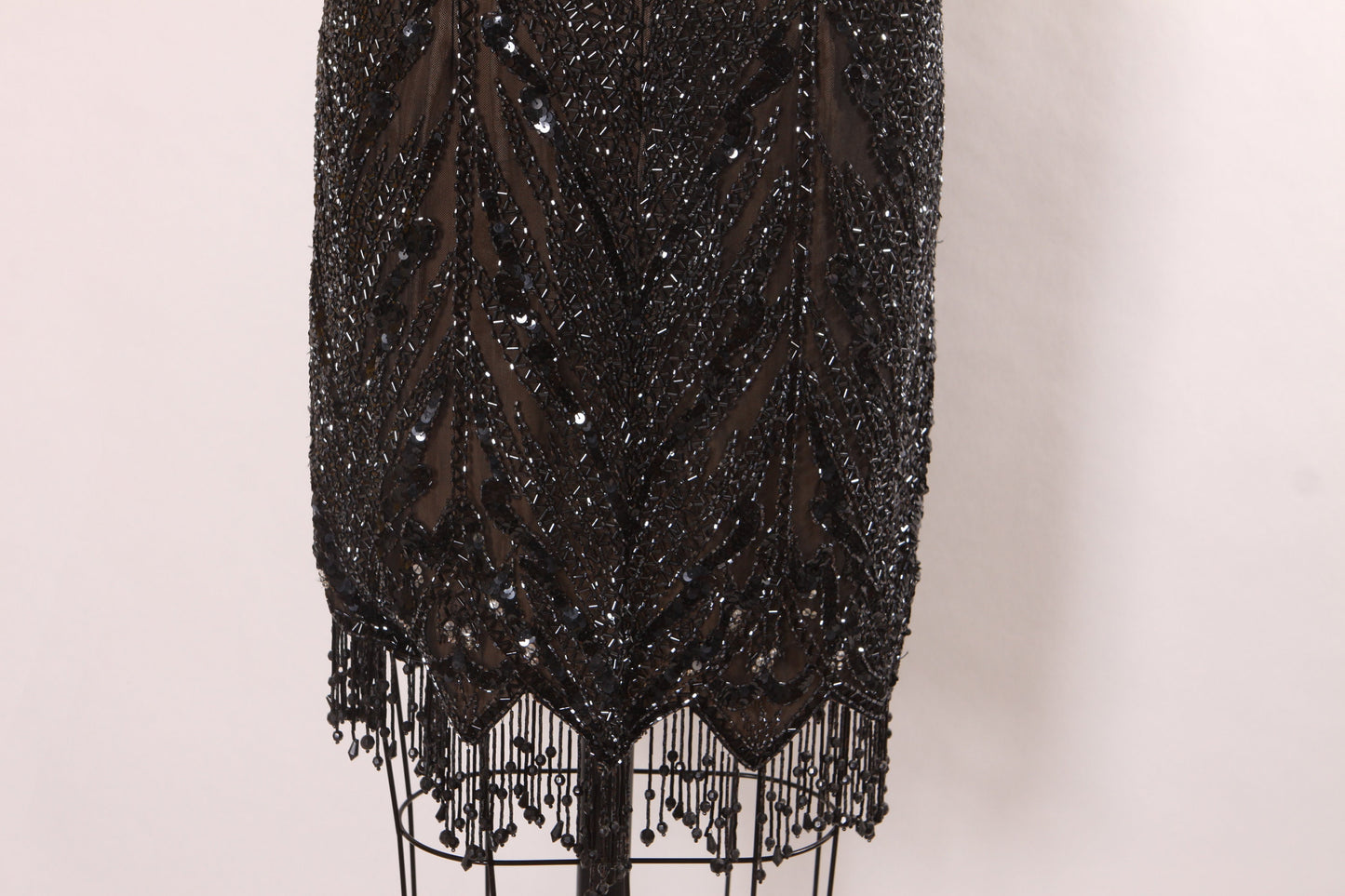 Late 1980s Early 1990s Black Sequin and Beaded Fringe Short Sleeve Flapper Style Sheer Nude Illusion Dress by Peak Evenings -M